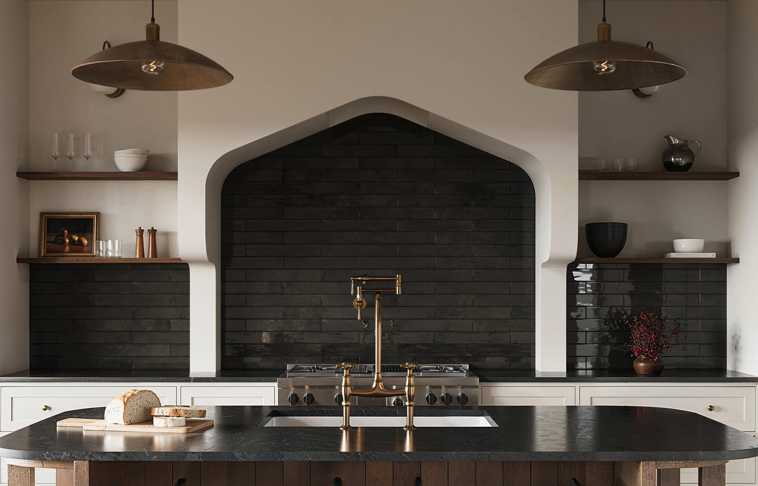 Dark horizontal stacked subway tiles create a dramatic, arched kitchen backsplash with brass fixtures and open shelving.