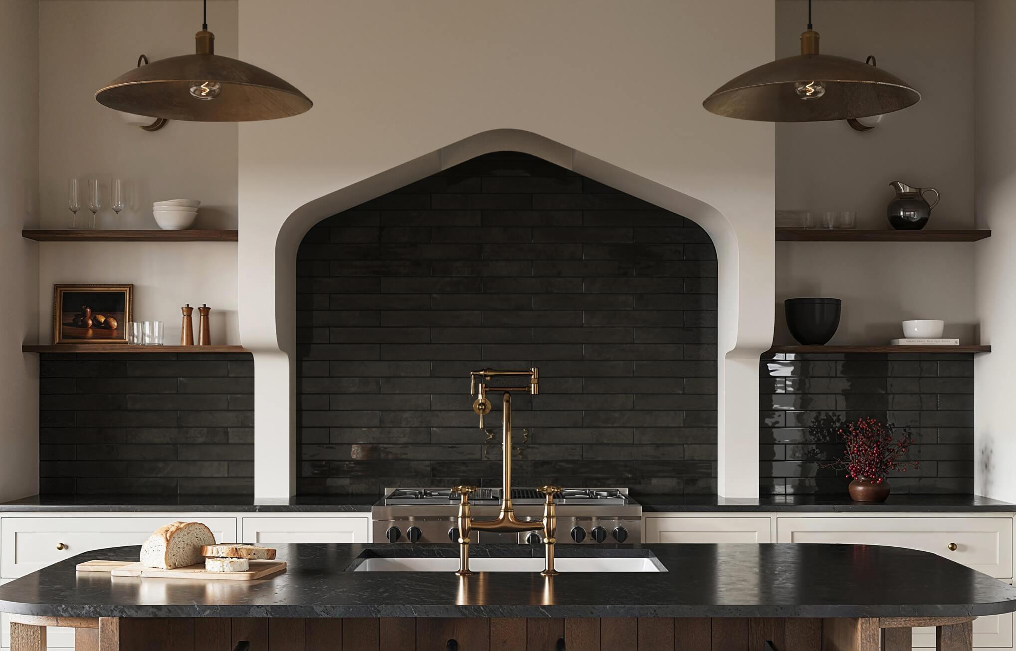 Dark horizontal stacked subway tiles create a dramatic, arched kitchen backsplash with brass fixtures and open shelving.