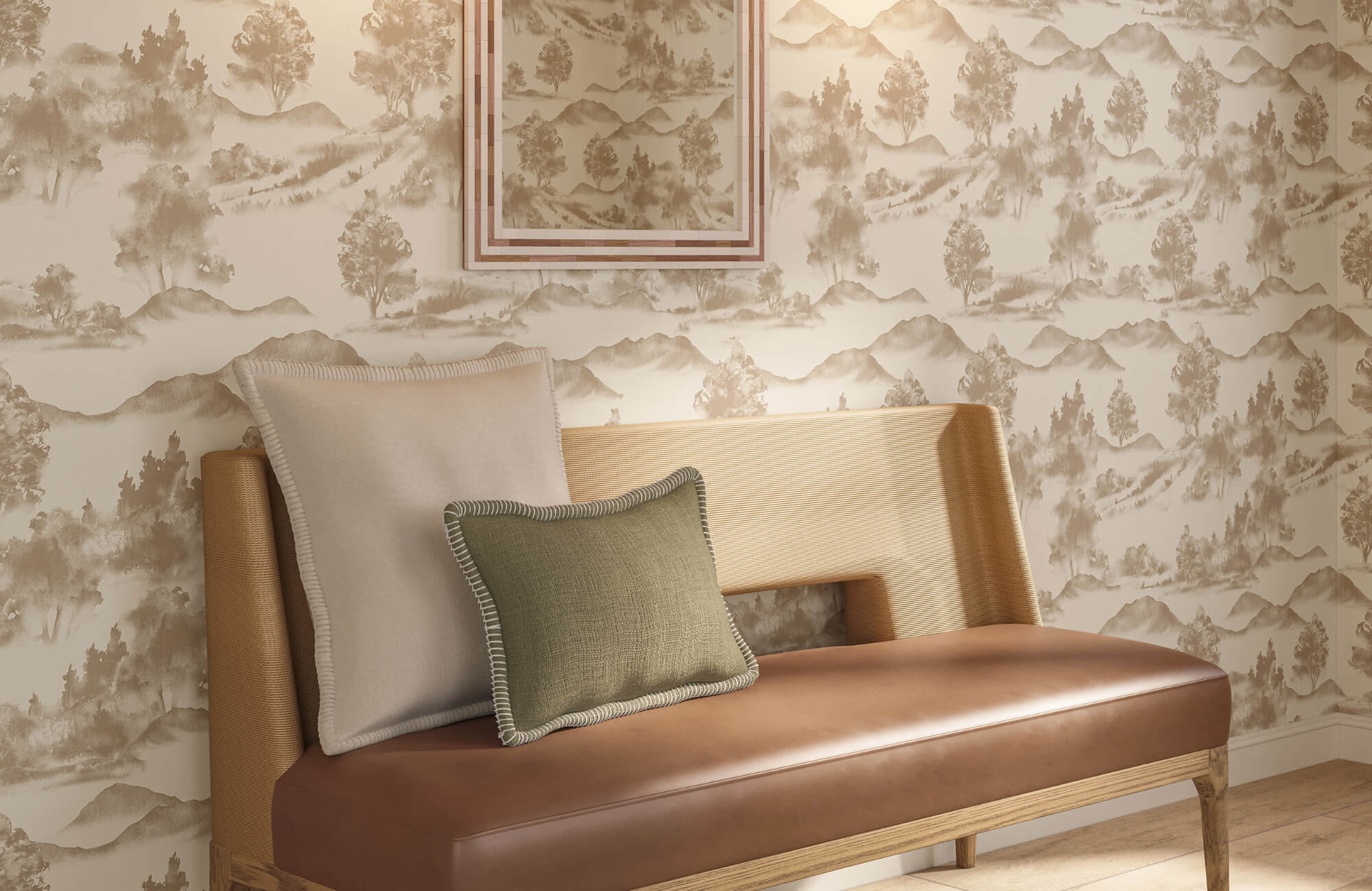 Leather bench with two accent pillows against scenic wallpaper, creating a calm and intentionally styled seating area indoors.