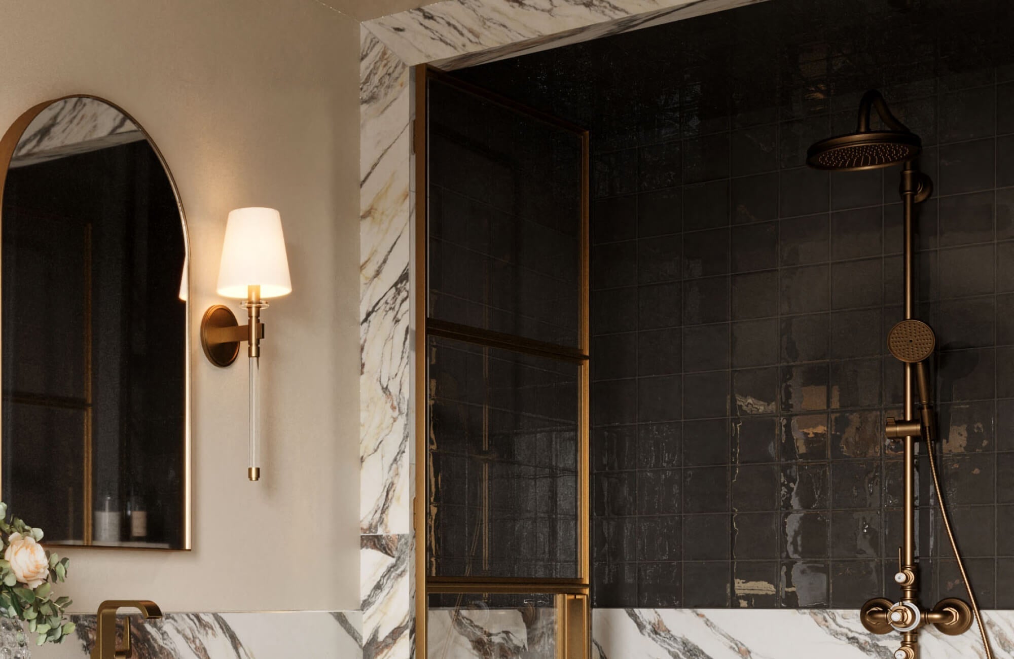 Elegant bathroom featuring glossy black ceramic shower tiles with dramatic veining in the surrounding marble, paired with warm brass fixtures and a soft-glow wall sconce for a rich, luxurious contrast