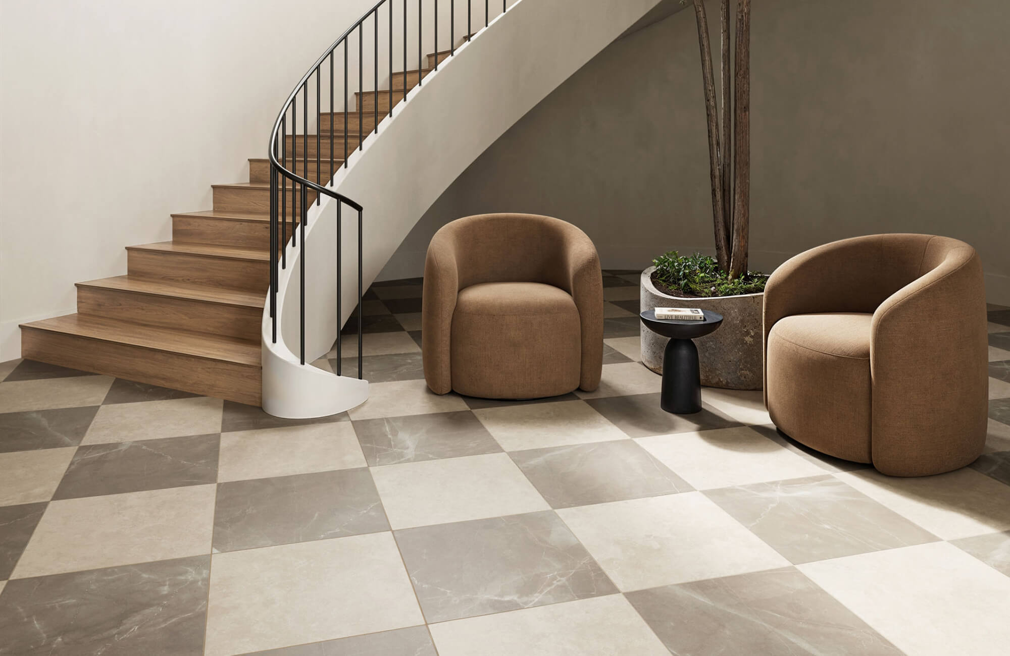 Modern staircase seating area with neutral checkerboard tile floor, showing how soft beige and taupe tones create a subtle pattern that complements contemporary interiors without feeling overly bold.