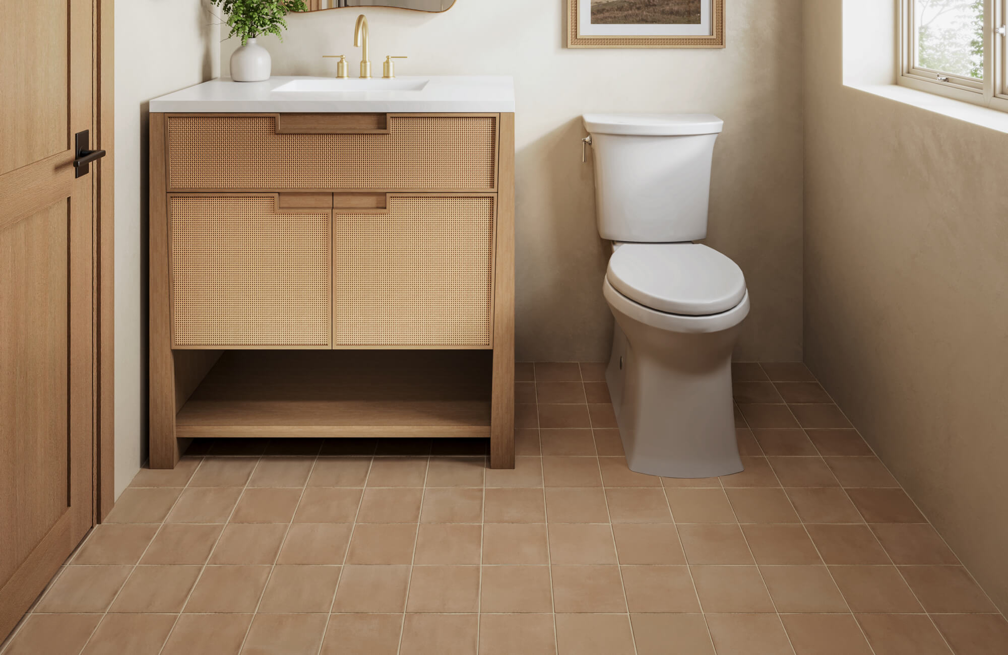 Warm beige porcelain bathroom tiles with a subtle matte finish, complementing a light wood vanity and soft neutral decor.