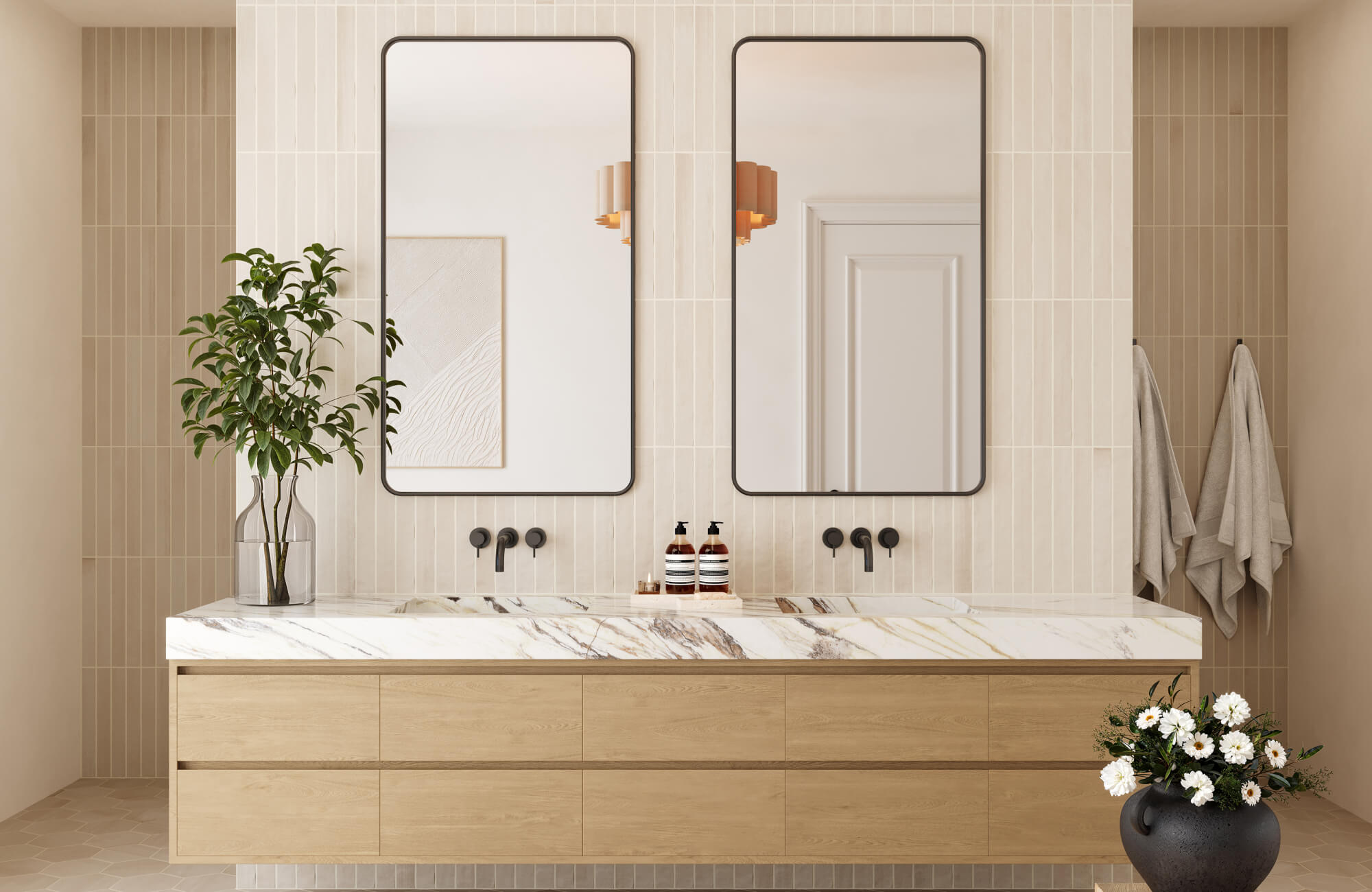 Modern bathroom with vertical beige subway tiles, floating wood vanity, marble countertop, and matte black fixtures.