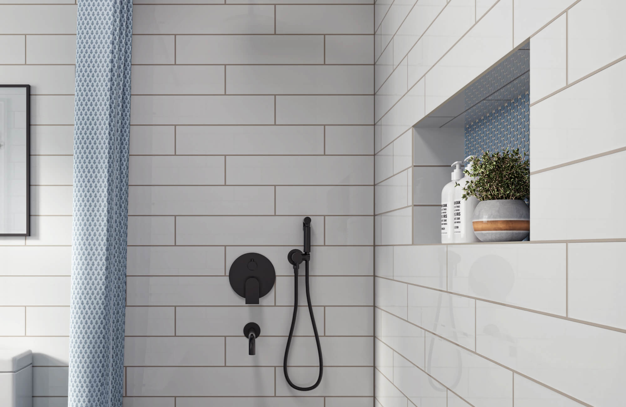 Sleek white ceramic subway tiles with light grout lines create a modern shower wall, accented by a niche with blue penny round tiles.