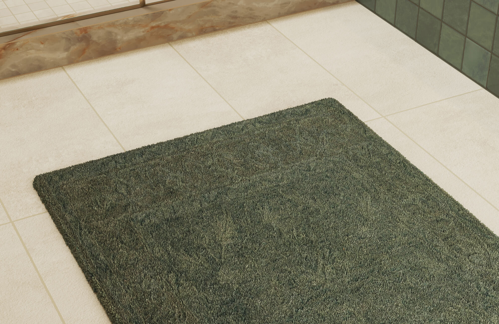 Soft green wool rug on beige floor tiles, bringing a warm and comfortable feel to a clean bathroom setting.