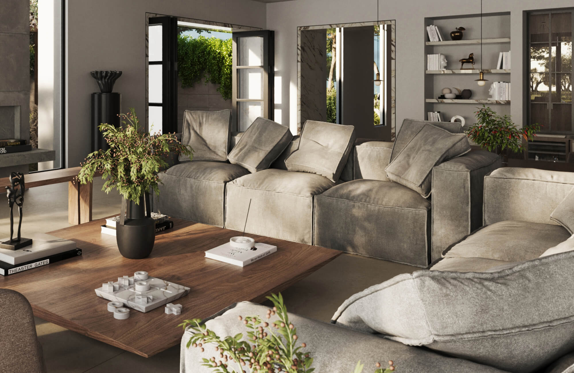Modern modular gray sofa in a contemporary interior with warm wood accents and layered décor.