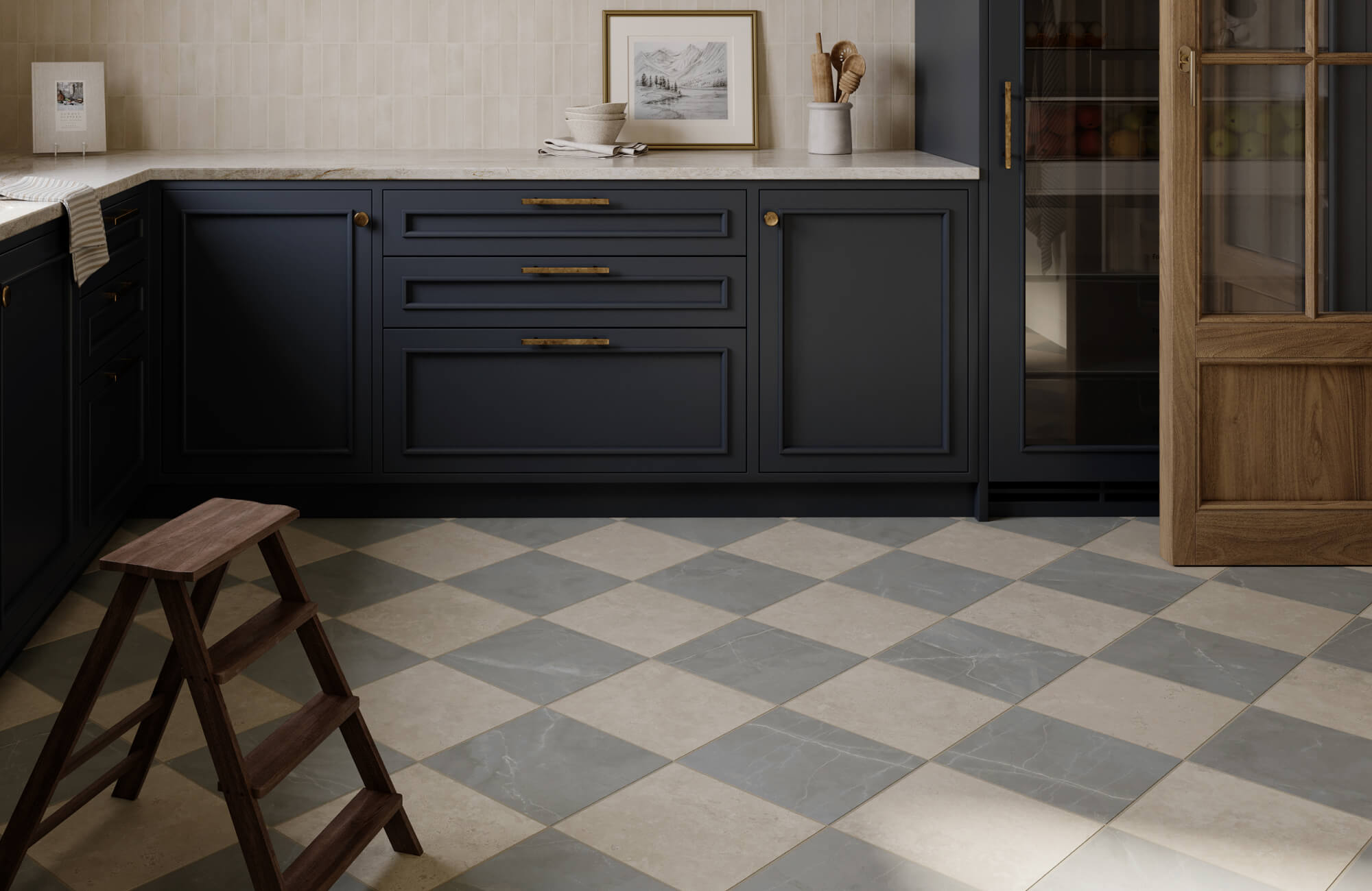 Gray and beige checkerboard floor tiles installed on a diagonal in a kitchen with dark navy cabinetry and wood accents.