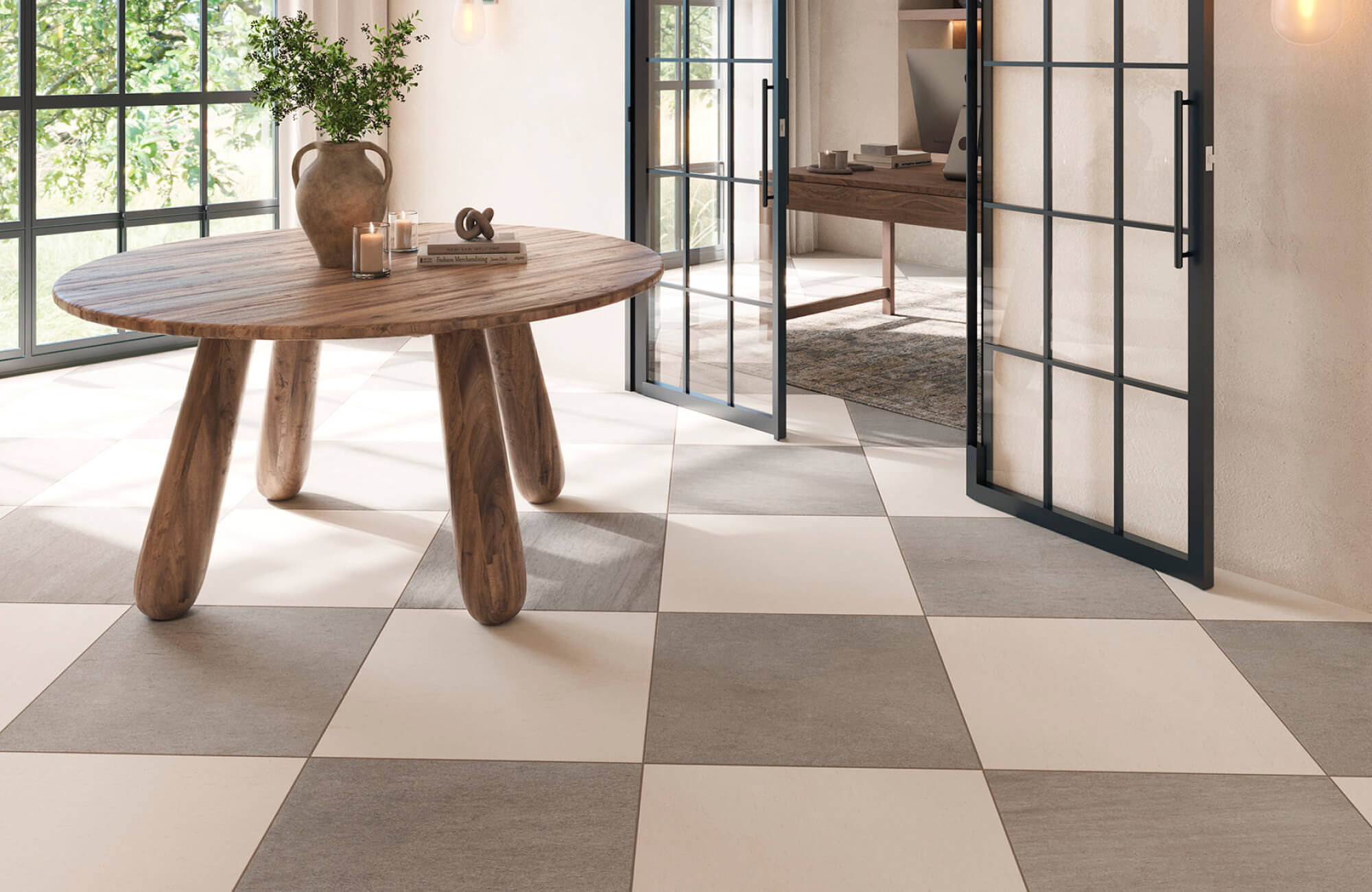 Gray-and-cream porcelain checkerboard tiles ground a modern space with a sculptural wood table and glass doors.