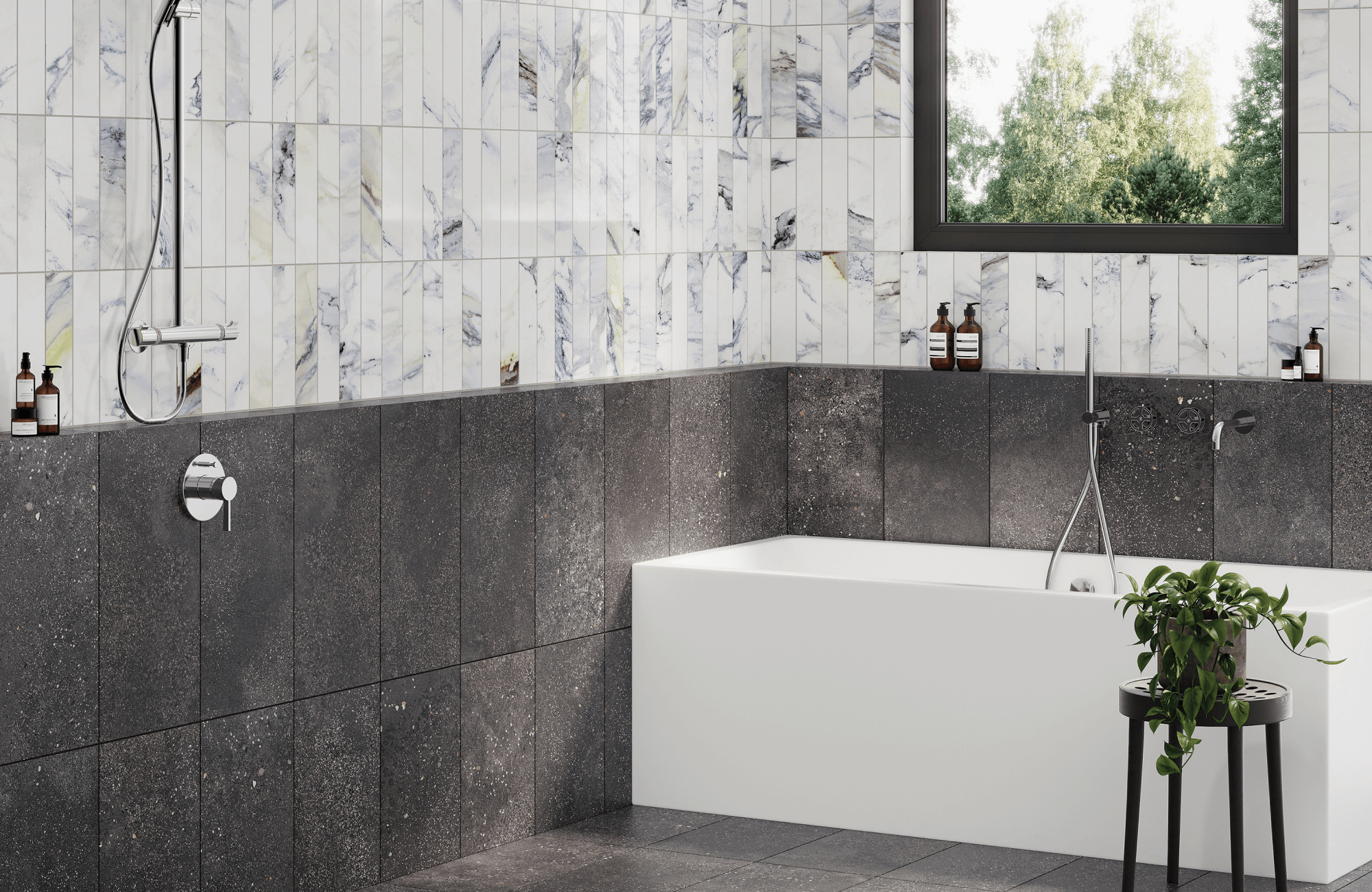 Modern bathroom with polished white marble-look vertical tiles, dark charcoal stone-look wall and floor tiles, a rectangular white tub, chrome shower fixtures, and a black-framed window overlooking greenery.