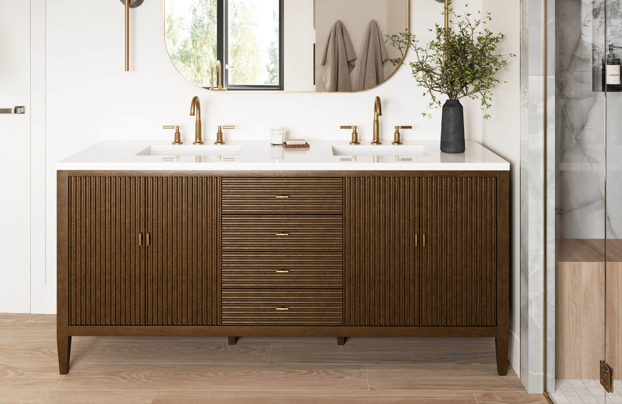 Rich wood double vanity with fluted cabinetry, white countertop, and brushed brass fixtures in a modern bathroom.