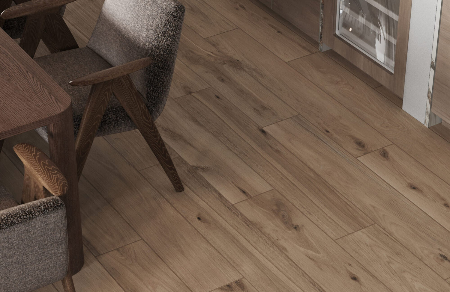 Close-up of wood look porcelain floor tiles with realistic grain, paired with dark wood furniture and textured chairs.