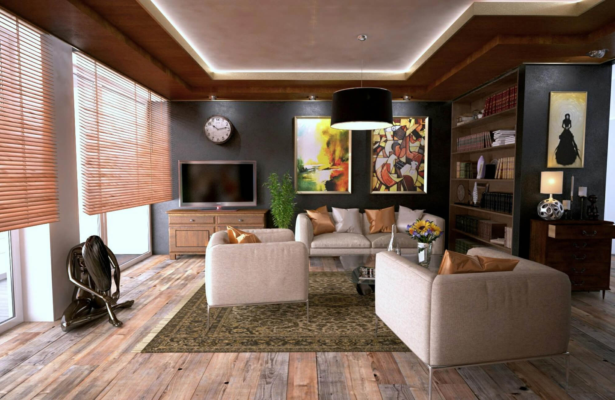Cozy living room with warm wood plank floors and an ornate olive-toned rug anchoring neutral seating and bold art.