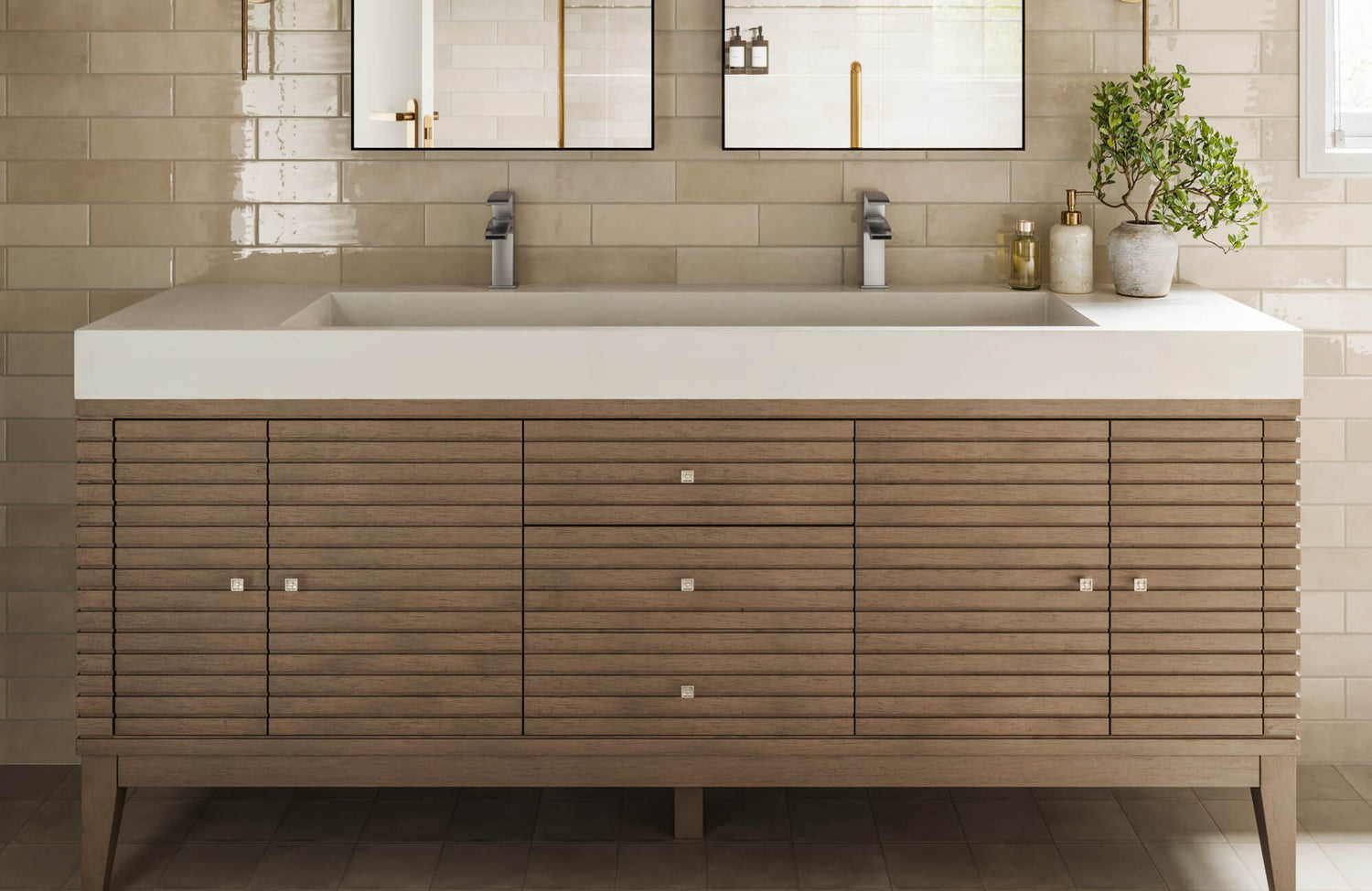 Bathroom vanity with horizontal slatted wood cabinet design, integrated double sink, chrome faucets, and beige glossy subway tile backsplash