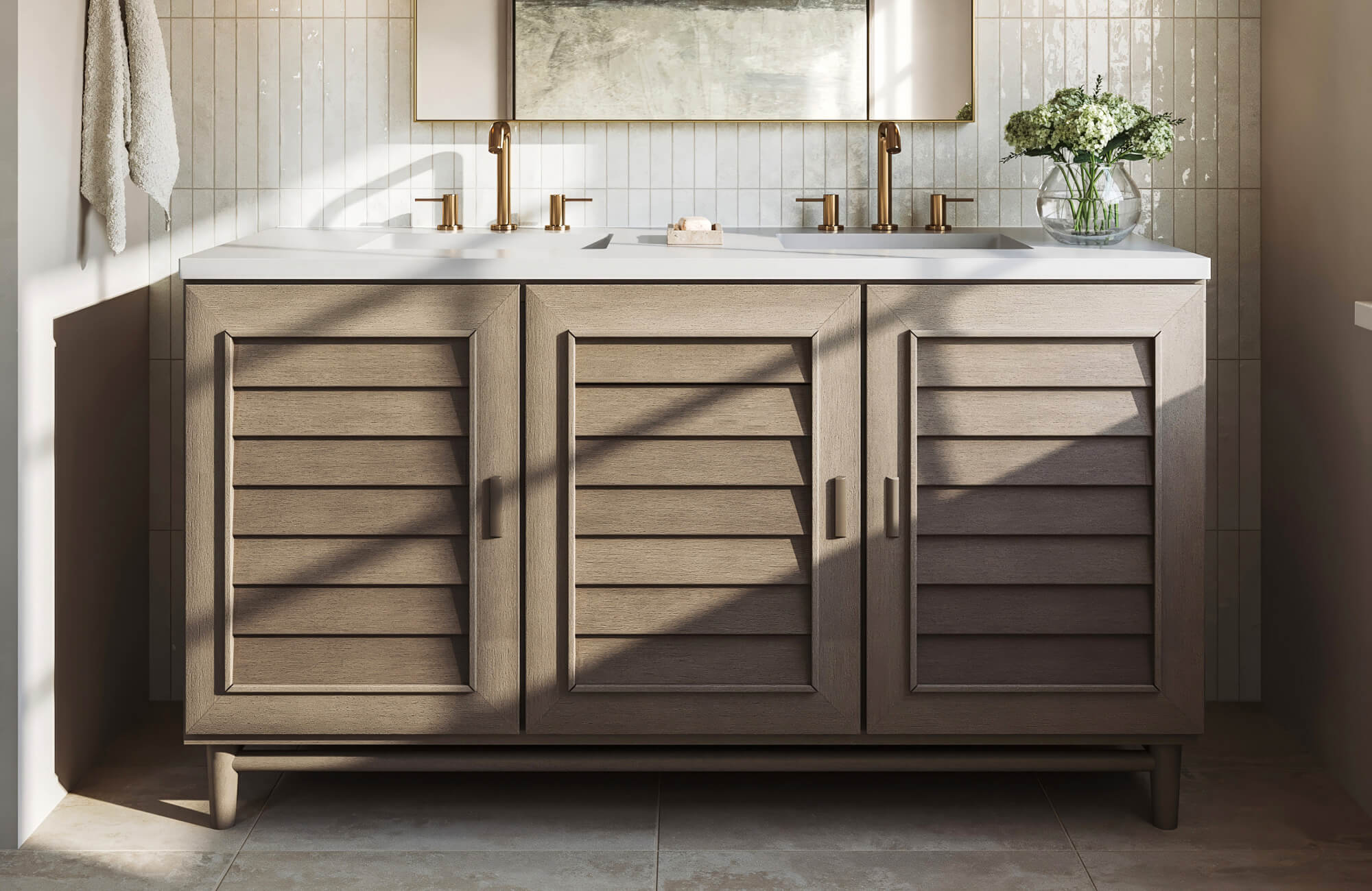 Vertical white tile backsplash with subtle sheen behind a double vanity, paired with brushed brass fixtures and a slatted wood cabinet.