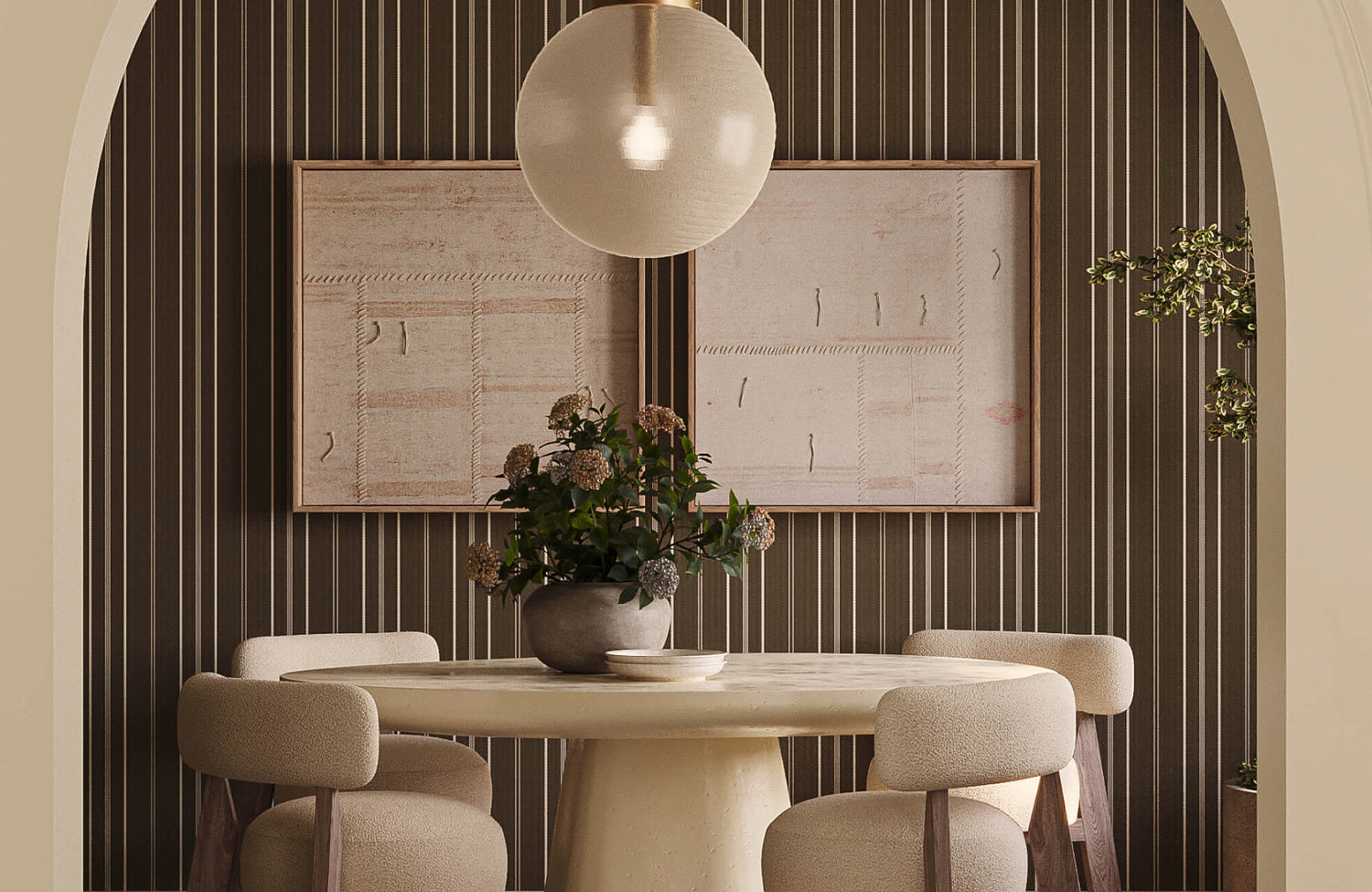 Modern organic dining nook with striped dark wallpaper, abstract wall art, sculptural round table, boucle chairs, and warm globe pendant.