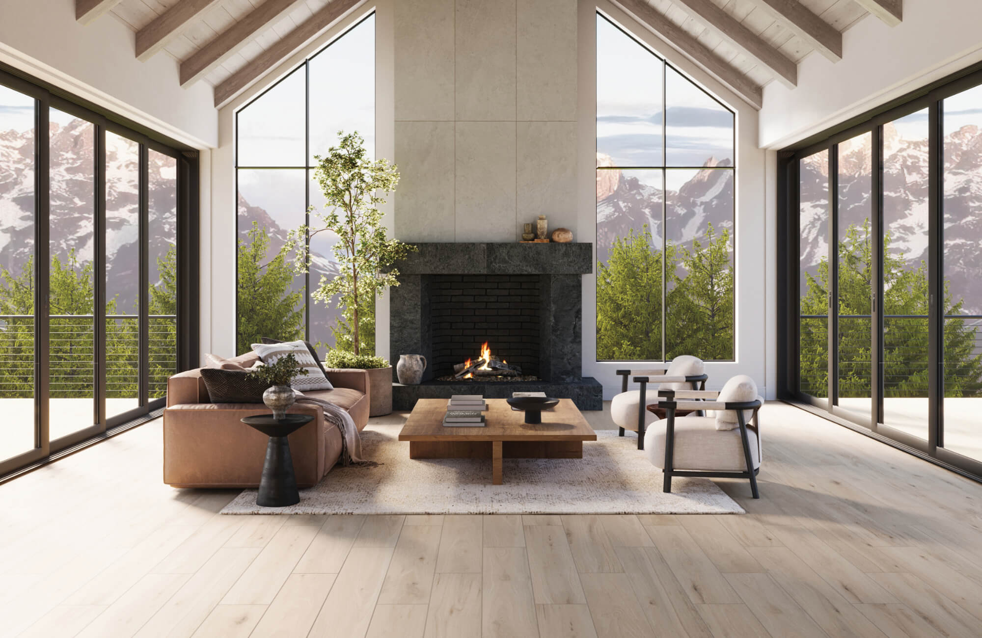 Modern mountain-view living room with wood look tile flooring, vaulted ceilings, and a stone fireplace surrounded by large glass windows.