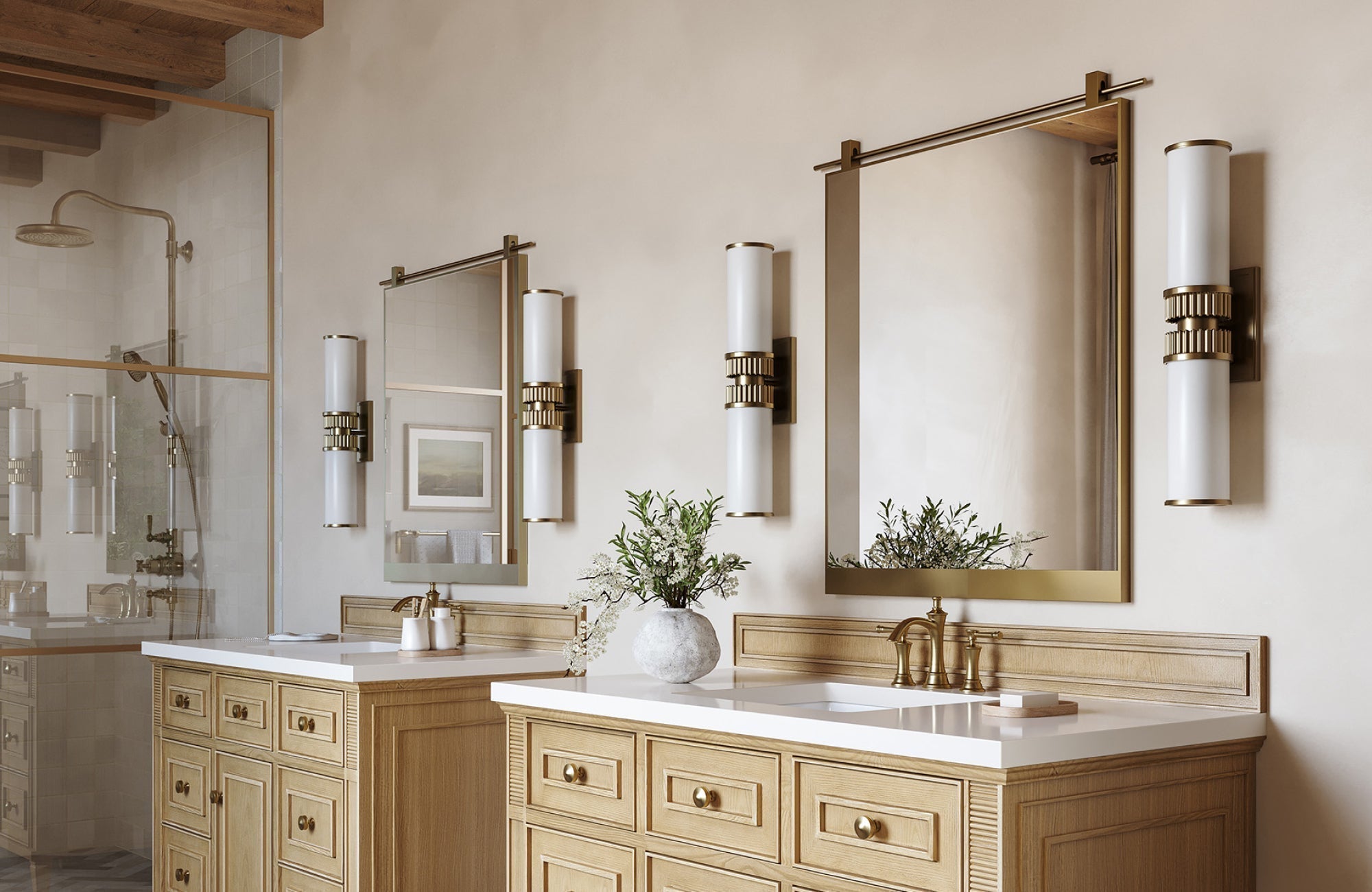 Bathroom vanity with two wall sconces on each side of the mirrors, providing balanced illumination for dual sinks.