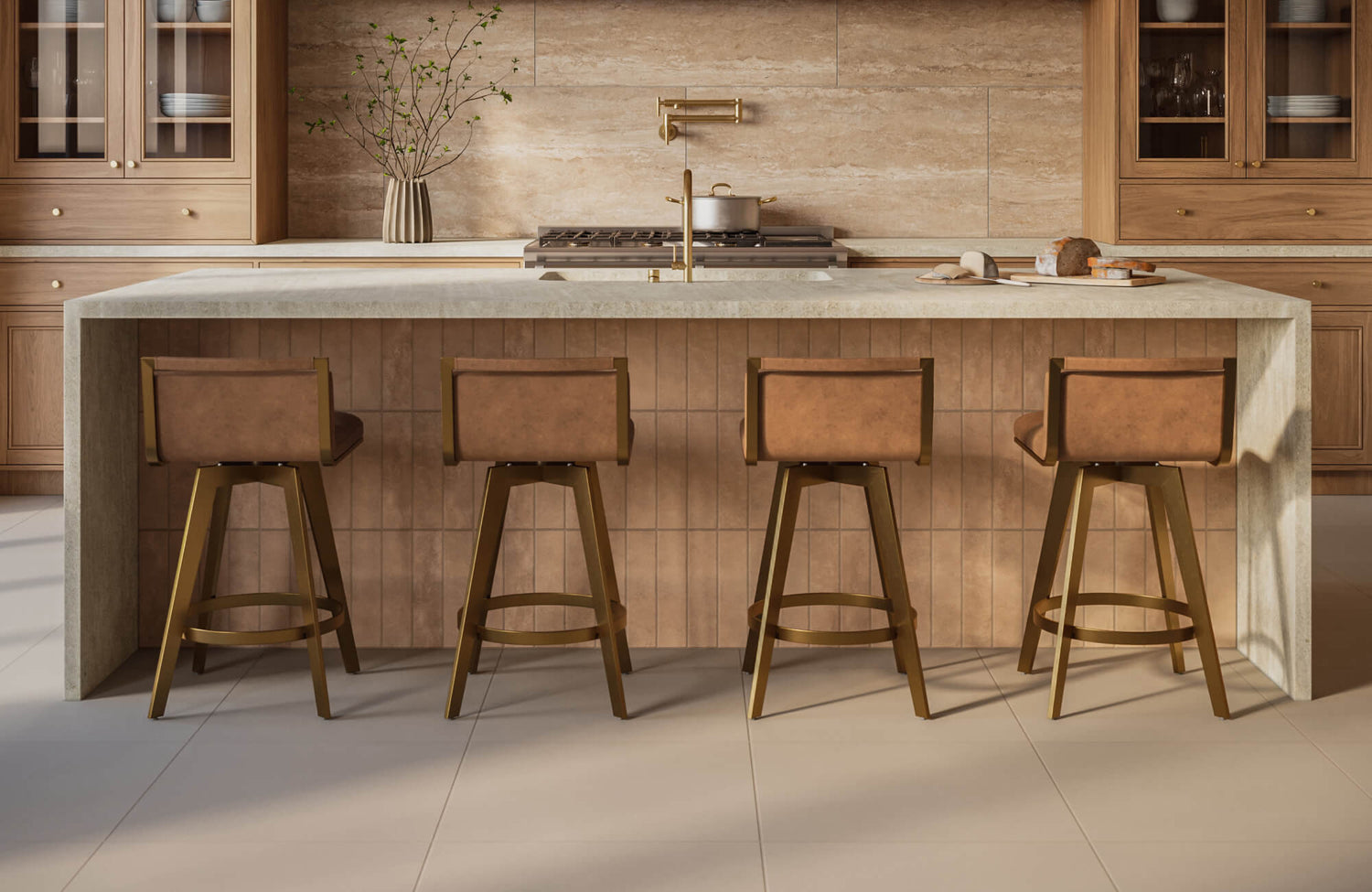 Kitchen island with four evenly spaced stools, showing balanced seating along a wide countertop.