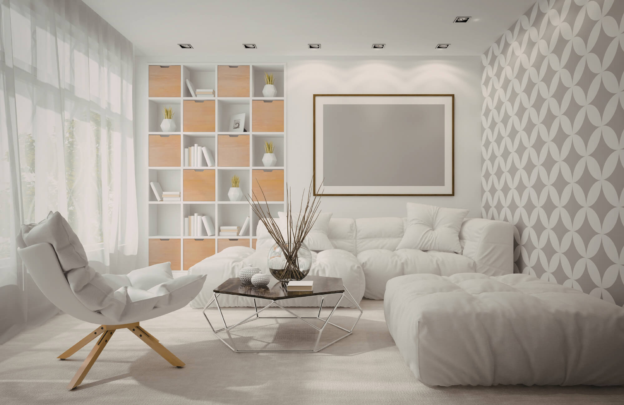 Bright living room with white sectional, geometric wallpaper, built-in shelving, and neutral decor palette.