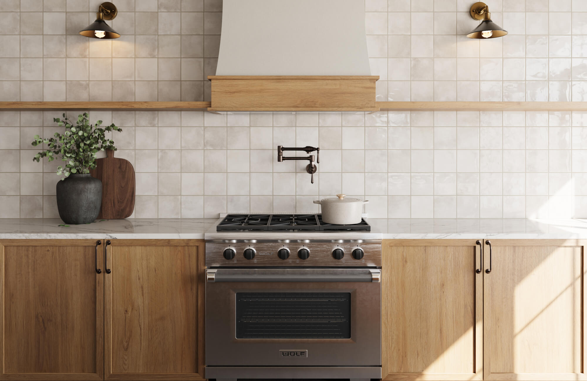 Kitchen with light wood cabinetry, a stainless steel range, square off-white tile backsplash, open wooden shelf, and wall-mounted pot filler, accented by a black vase with greenery.