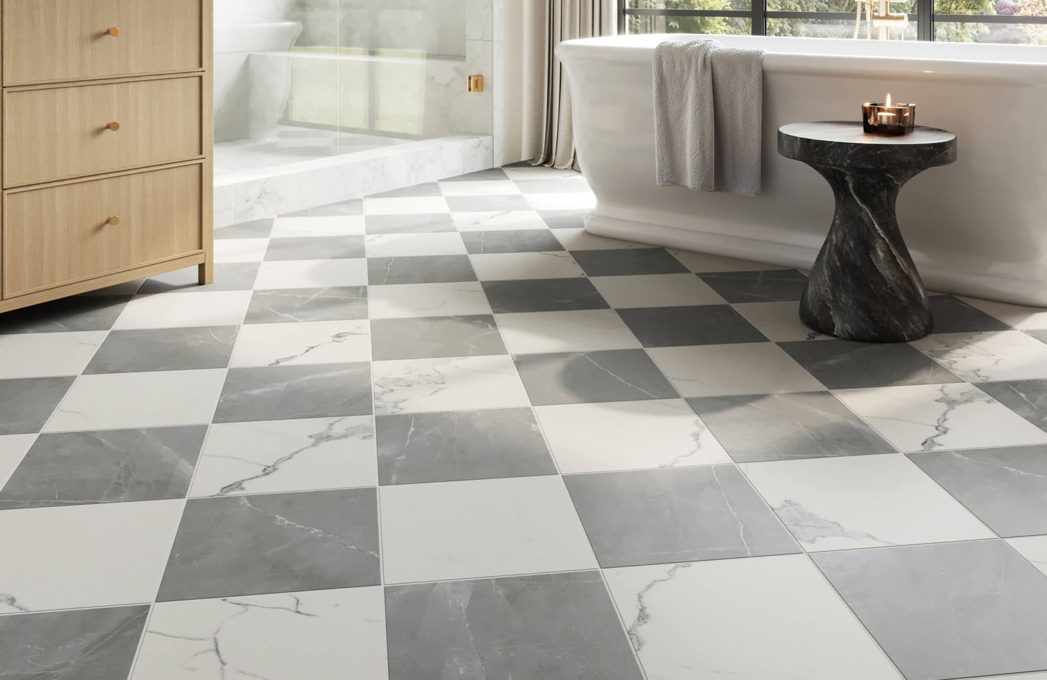 Modern bathroom featuring a gray and white checkerboard tile floor with marble veining, complemented by a freestanding tub and natural wood accents.