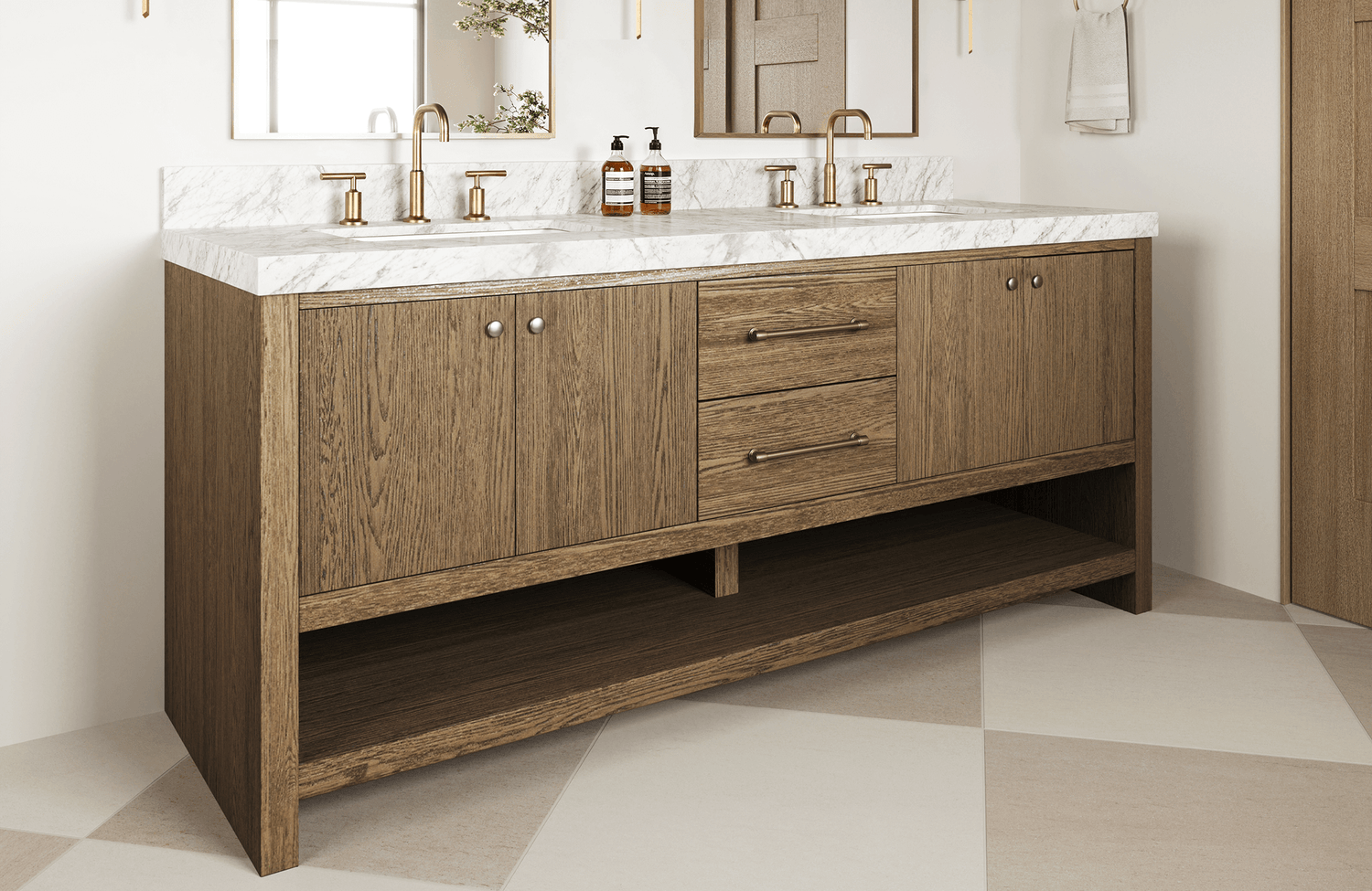 Double-sink vanity with warm oak wood finish, brushed brass fixtures, and a white marble countertop with subtle veining.