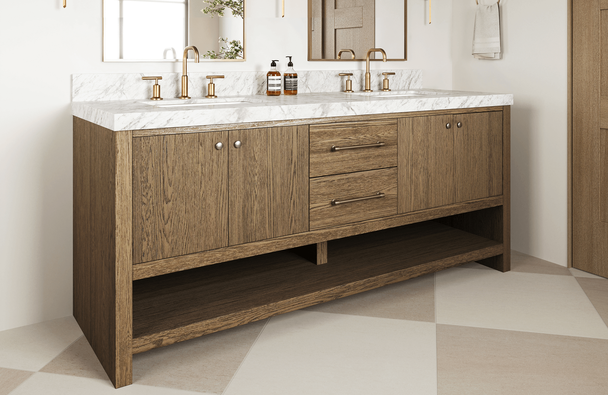 Double-sink vanity with warm oak wood finish, brushed brass fixtures, and a white marble countertop with subtle veining.