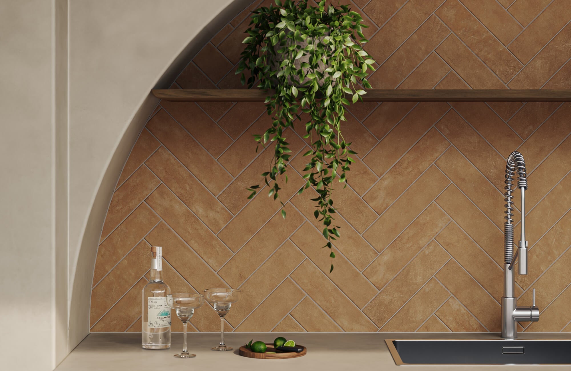 A herringbone subway tile backsplash in earthy brown tones adds character to this outdoor kitchen, pairing weather-resistant surfaces with a timeless design.