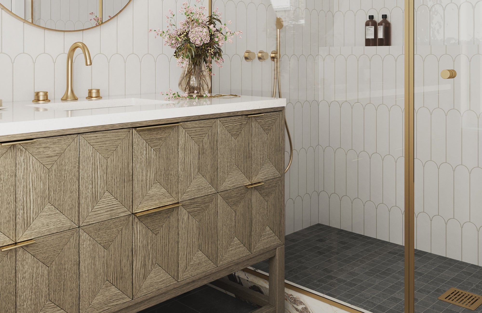 Textured wood 48-inch vanity with quartz top beside a glass shower and gold fixtures in a modern bathroom.