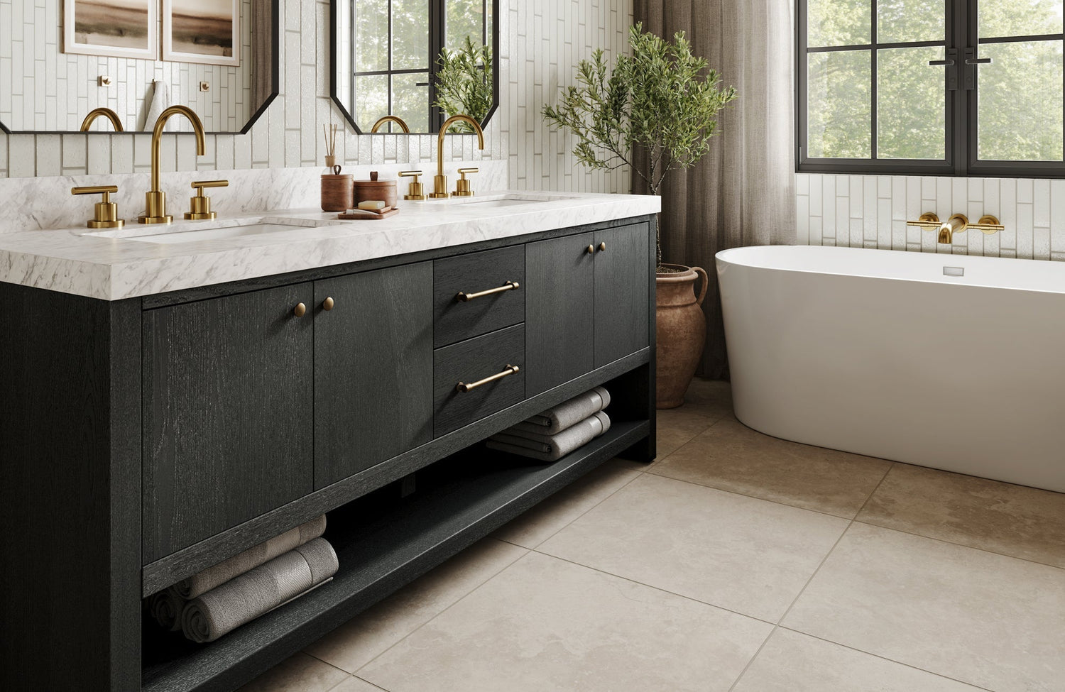 Black bathroom vanity with brass hardware and marble top beside a freestanding tub and tiled backsplash.