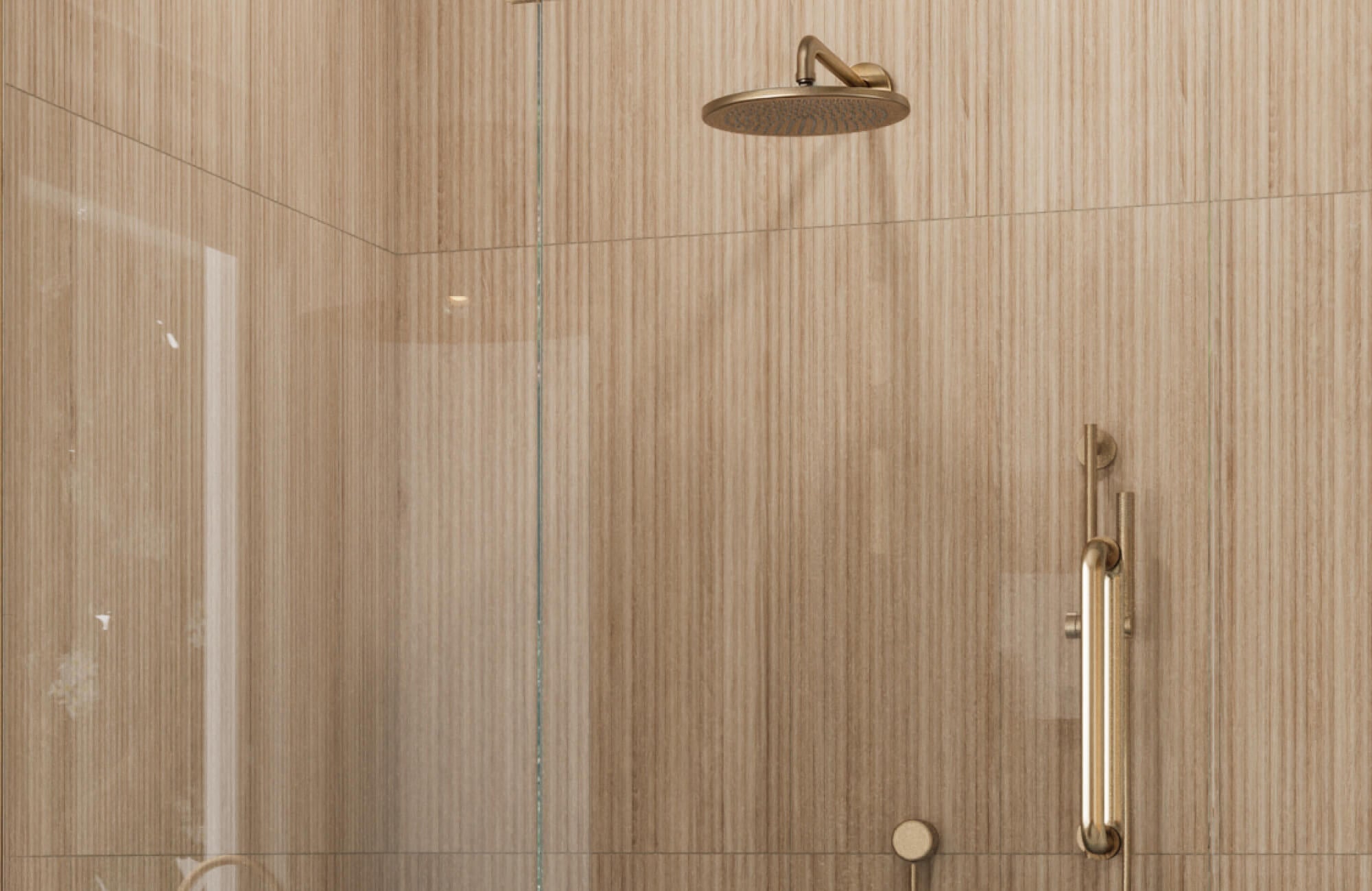 Brown vertical ceramic wood-look tiles in a sleek shower space with brass fixtures and a minimalist glass door.