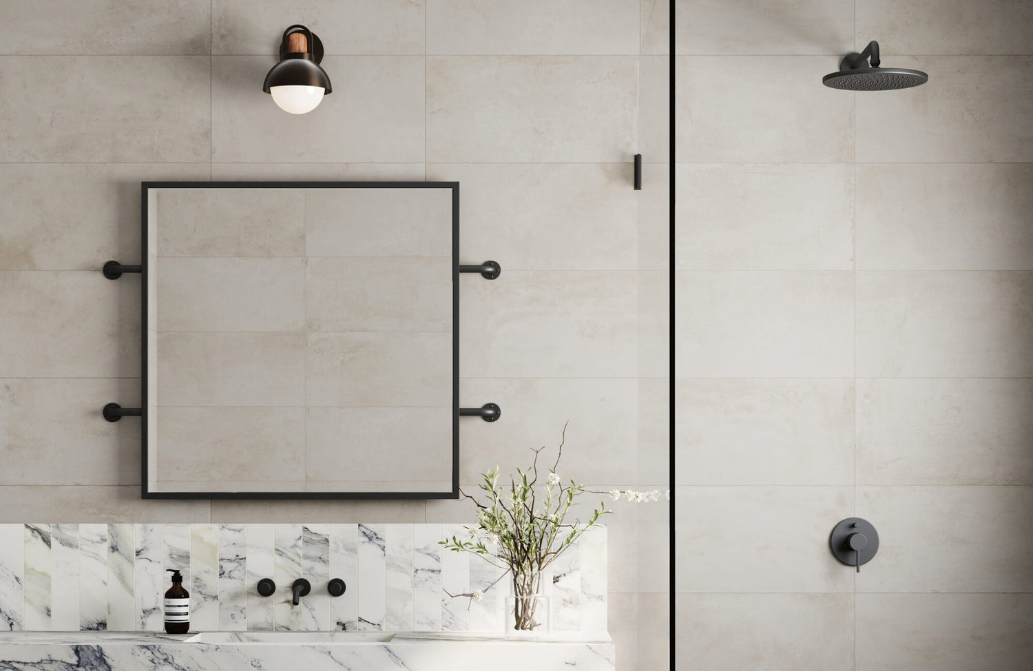 Minimalist square mirror with a bold black frame and side-mounted supports, set against soft matte beige tile.