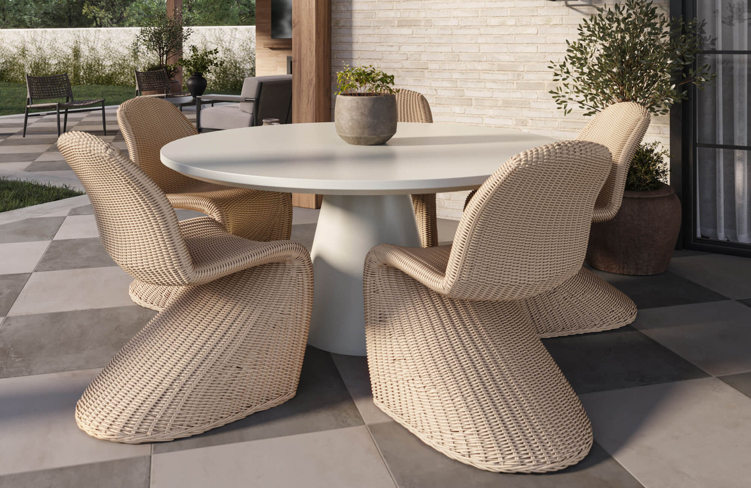 Gray and white checkerboard tile floor frame a round outdoor dining table with woven chairs in a sunlit garden setting.