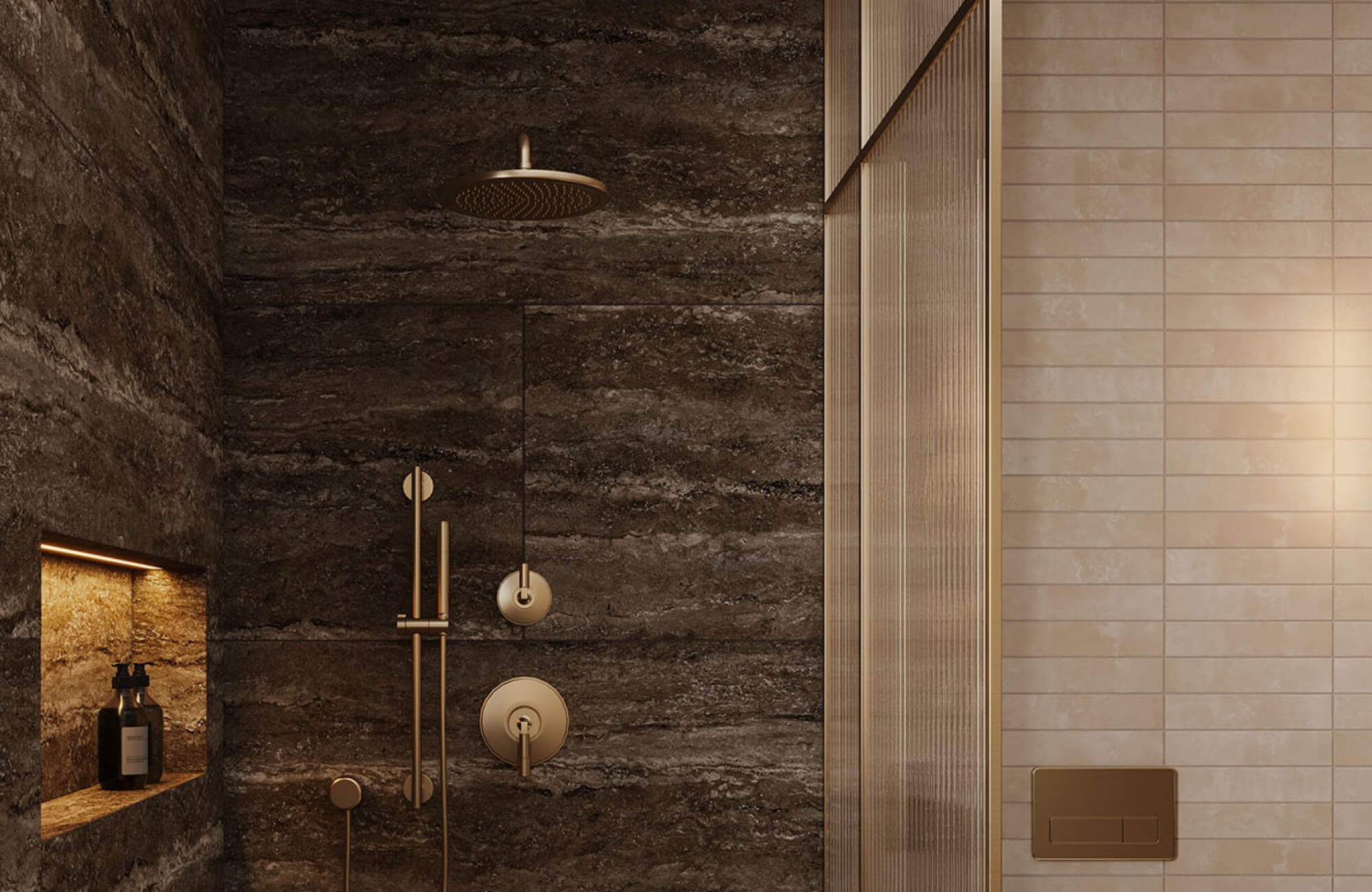 Dark stone-look shower tiles with warm brass fixtures create a dramatic, enclosed shower space with rich texture and depth.