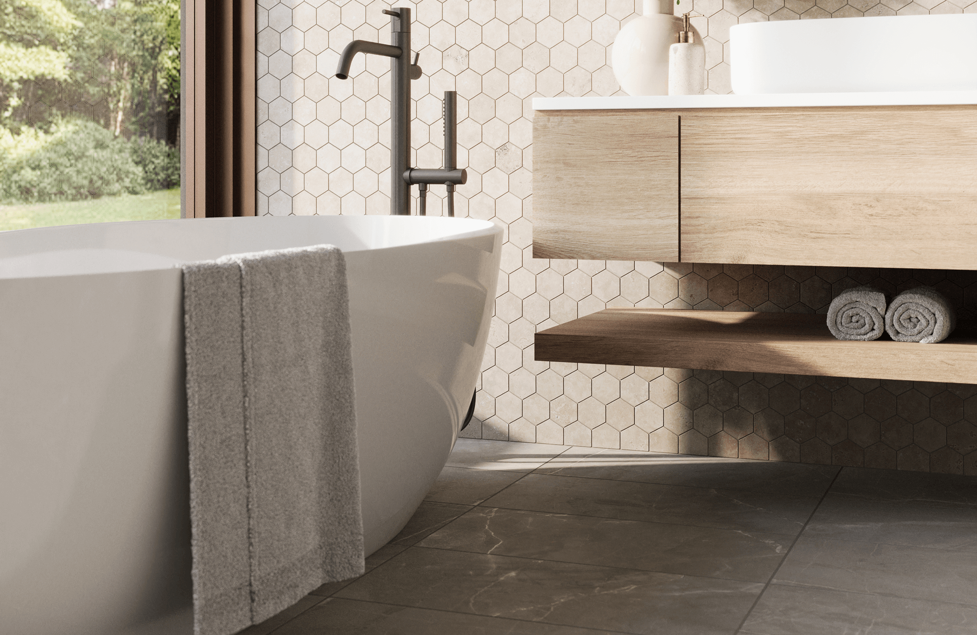 Elegant bathroom with large floor tiles and small hexagonal wall tiles, complementing a freestanding tub and floating wood vanity.