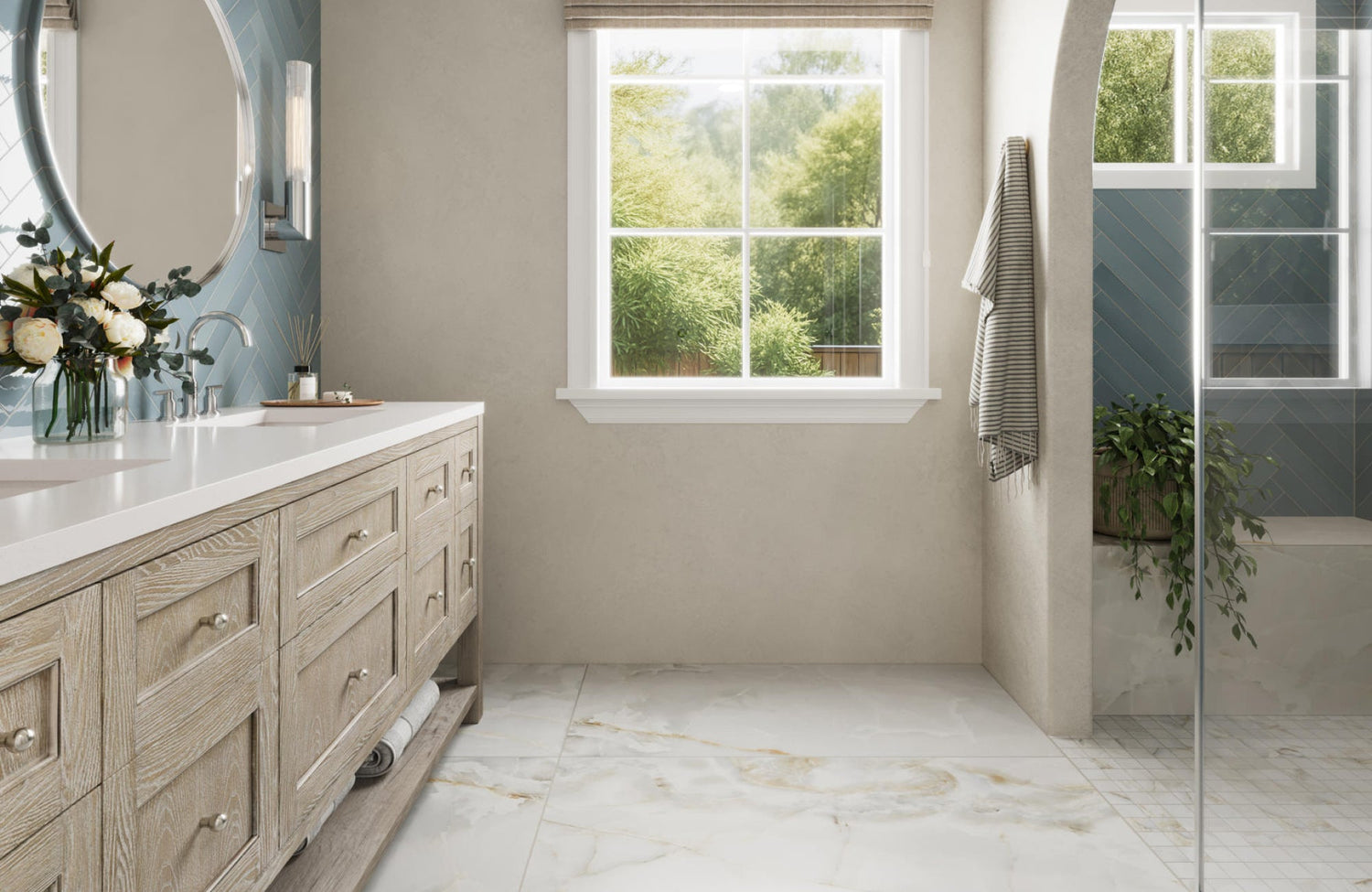 Light oak vanity with beige walls and marble-look tile flooring creating a soft, balanced, and elegant bathroom design.