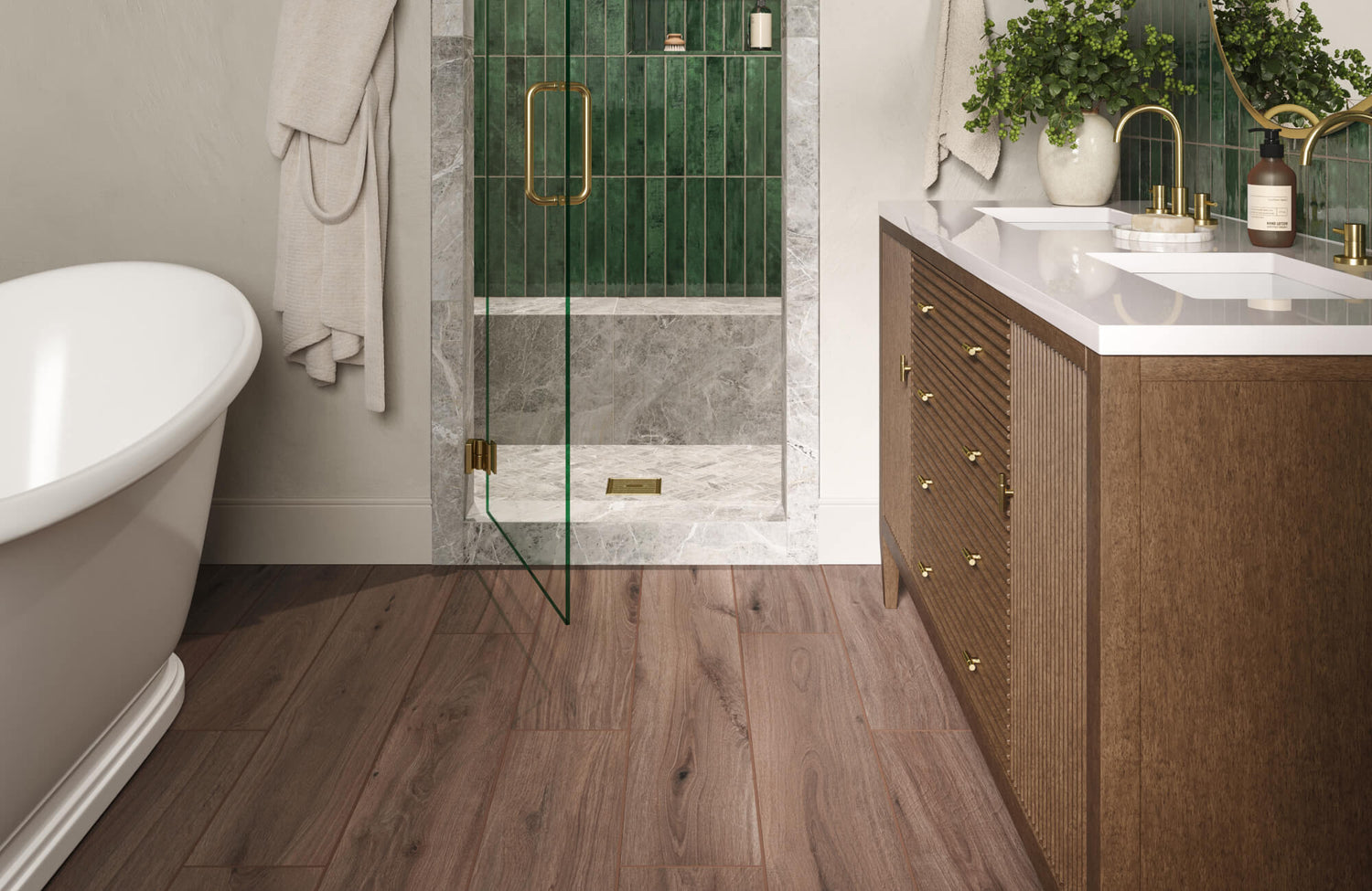 Rich wood look porcelain flooring anchors this spa-inspired bathroom, pairing elegantly with emerald green shower tiles and marble accents.
