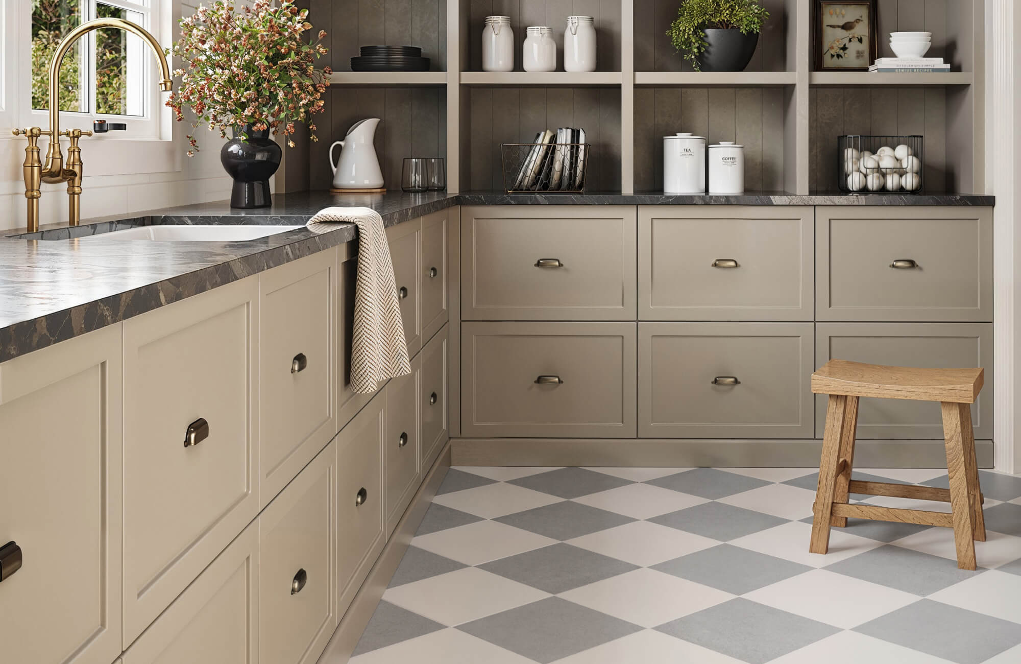 Cozy kitchen with beige cabinetry, a sleek marble countertop, and light grey and white chequered tiles, complemented by rustic wooden accents