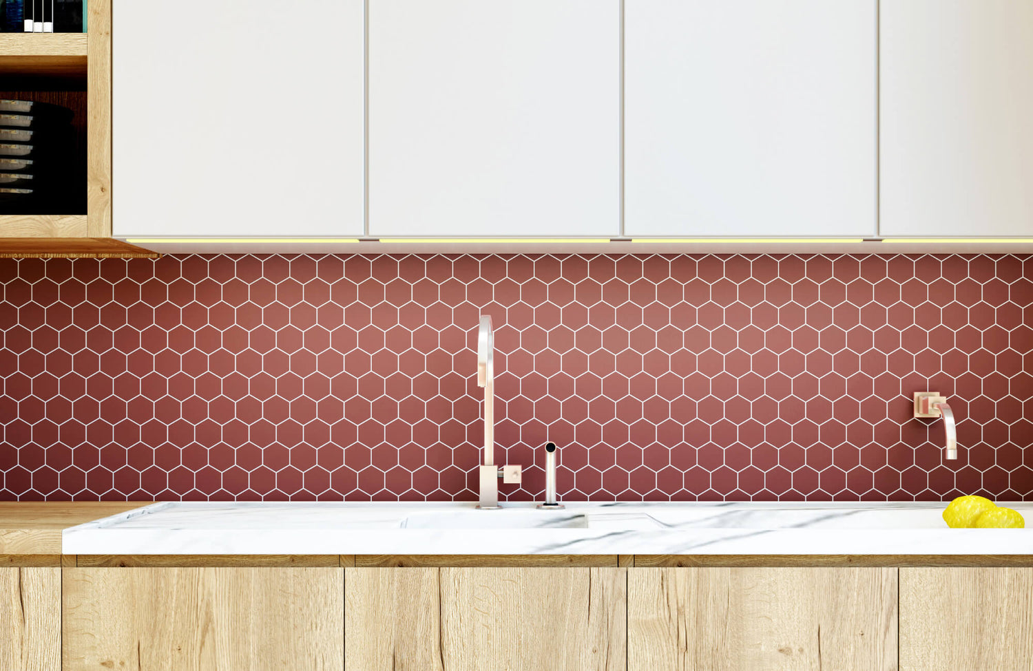 Modern kitchen with a red hexagon tile backsplash, white upper cabinets, wood lower cabinets, and a sleek sink with faucet.