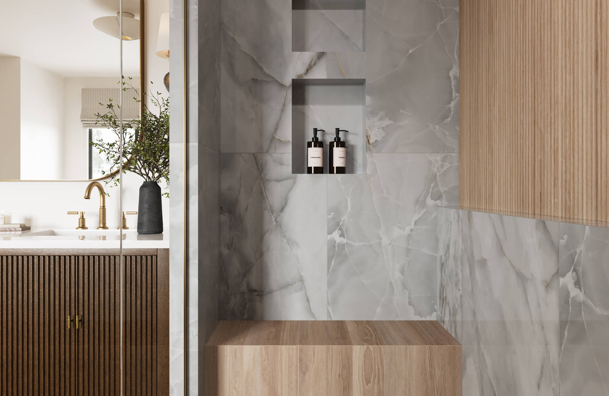 Full-height marble-look porcelain tiles in layered gray tones anchor the shower, contrasted by warm wood cabinetry and sleek glass enclosure.