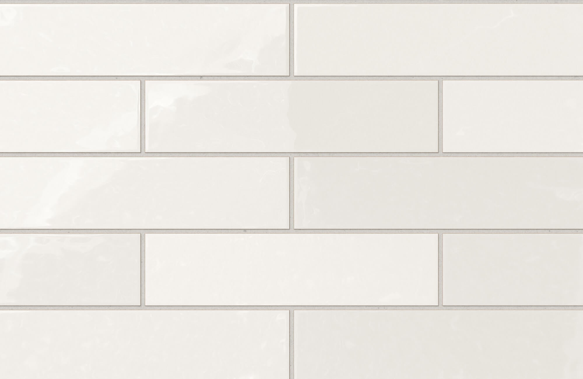 Glossy ceramic off-white subway tiles with subtle tonal variation create a clean, timeless look perfect for modern interiors.