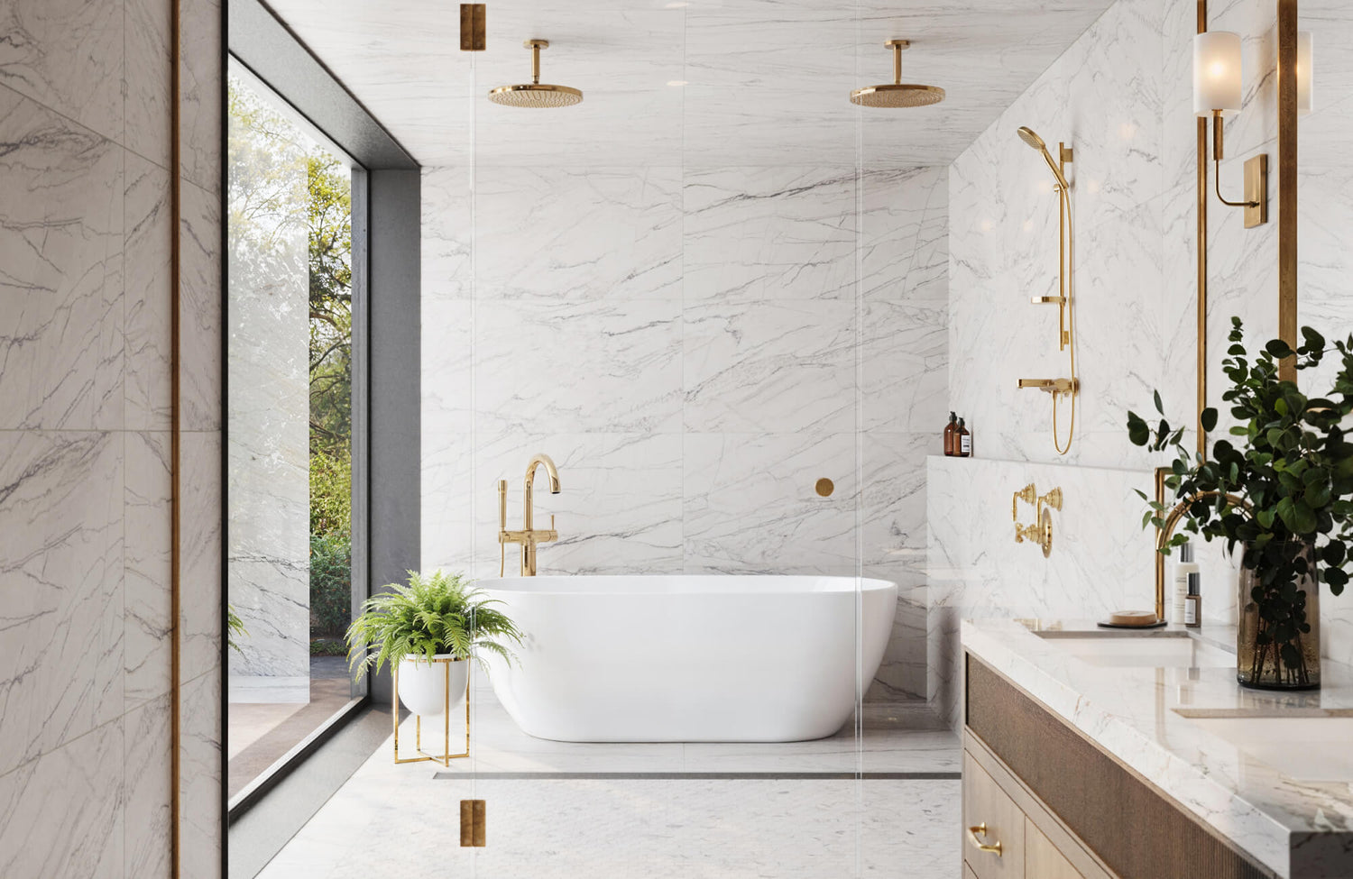 Large-format white marble-look porcelain tiles with soft gray veining, paired with brushed brass fixtures in a bright, minimalist bath.