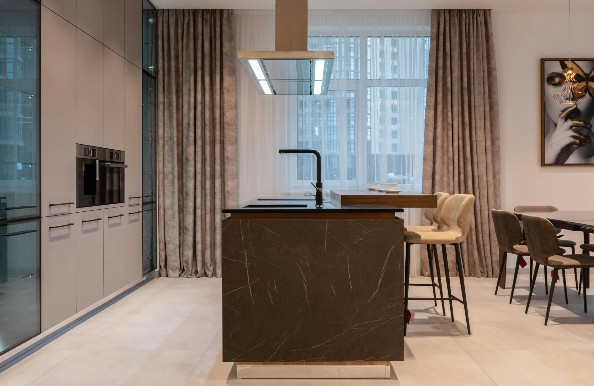 Modern kitchen island with contrasting raised counter section highlighting varied countertop heights for seating and prep.