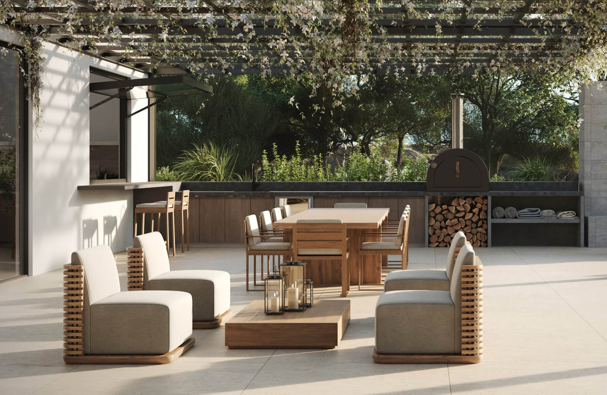 Outdoor patio with a wooden dining table and cushioned chairs beneath a vine-covered pergola, with lounge seating, a built-in bar, and a wood-fired oven in the background.