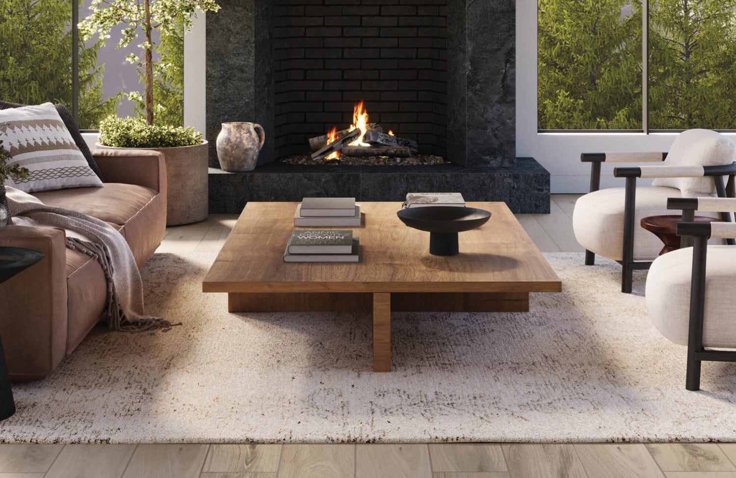 Cozy living space with a textured neutral rug, modern wood coffee table, and plush armchairs by a warm fireplace.