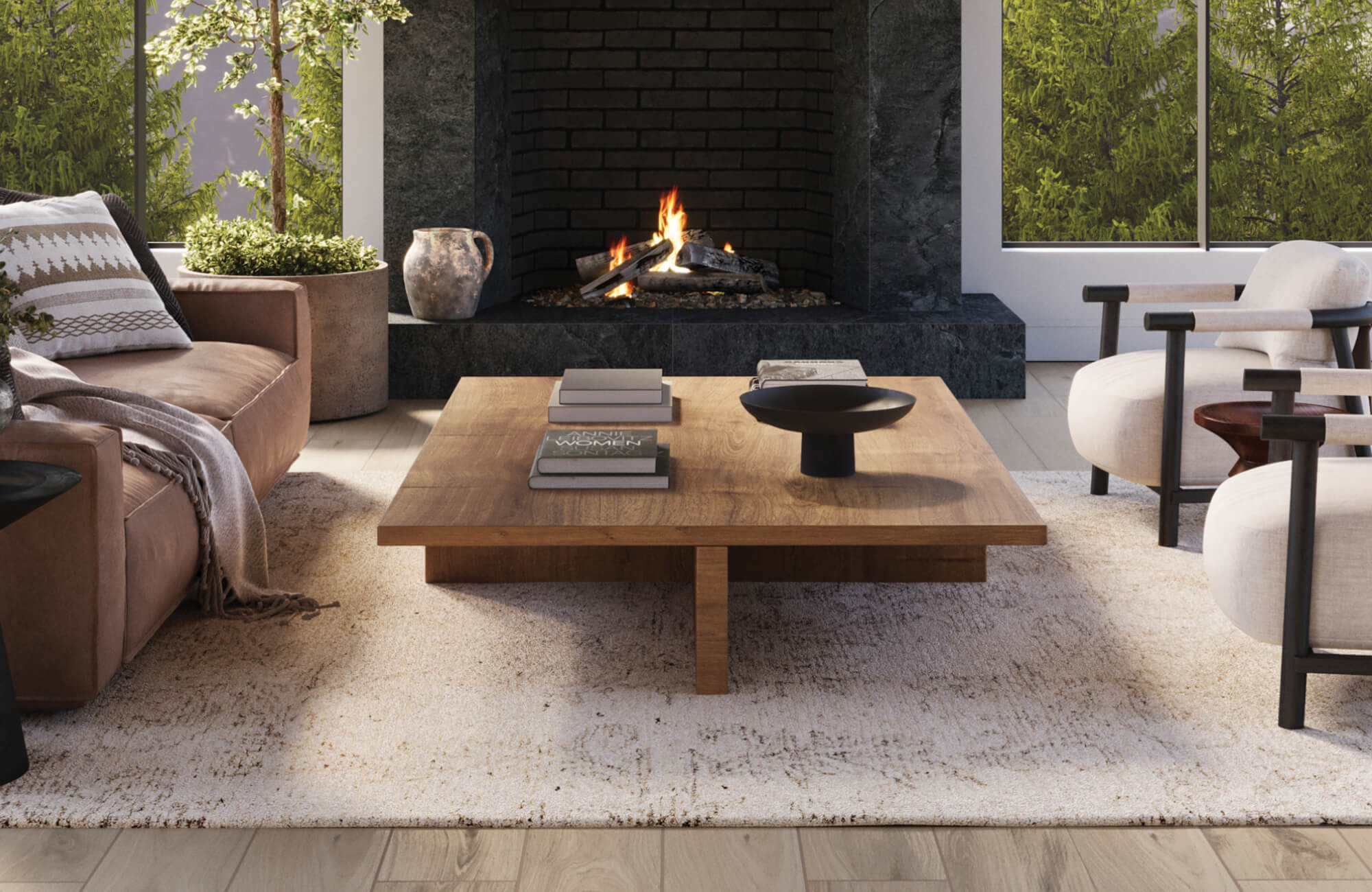 Cozy living space with a textured neutral rug, modern wood coffee table, and plush armchairs by a warm fireplace.