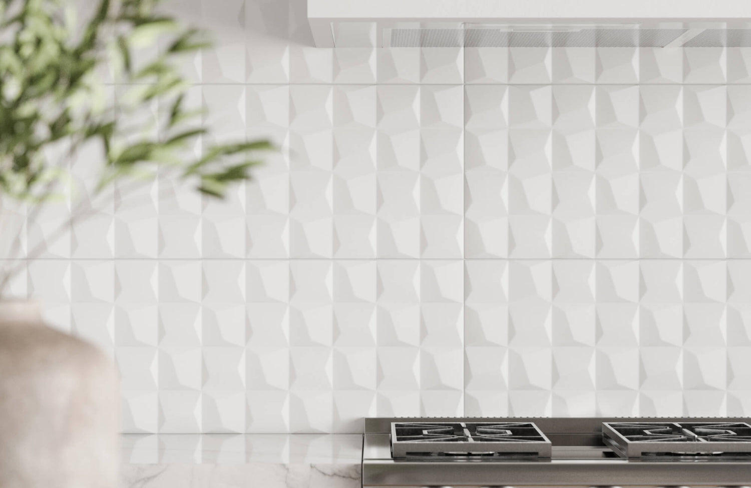 Sleek white 3D backsplash with a geometric cube pattern, adding depth and modern flair to a minimalist kitchen backsplash.