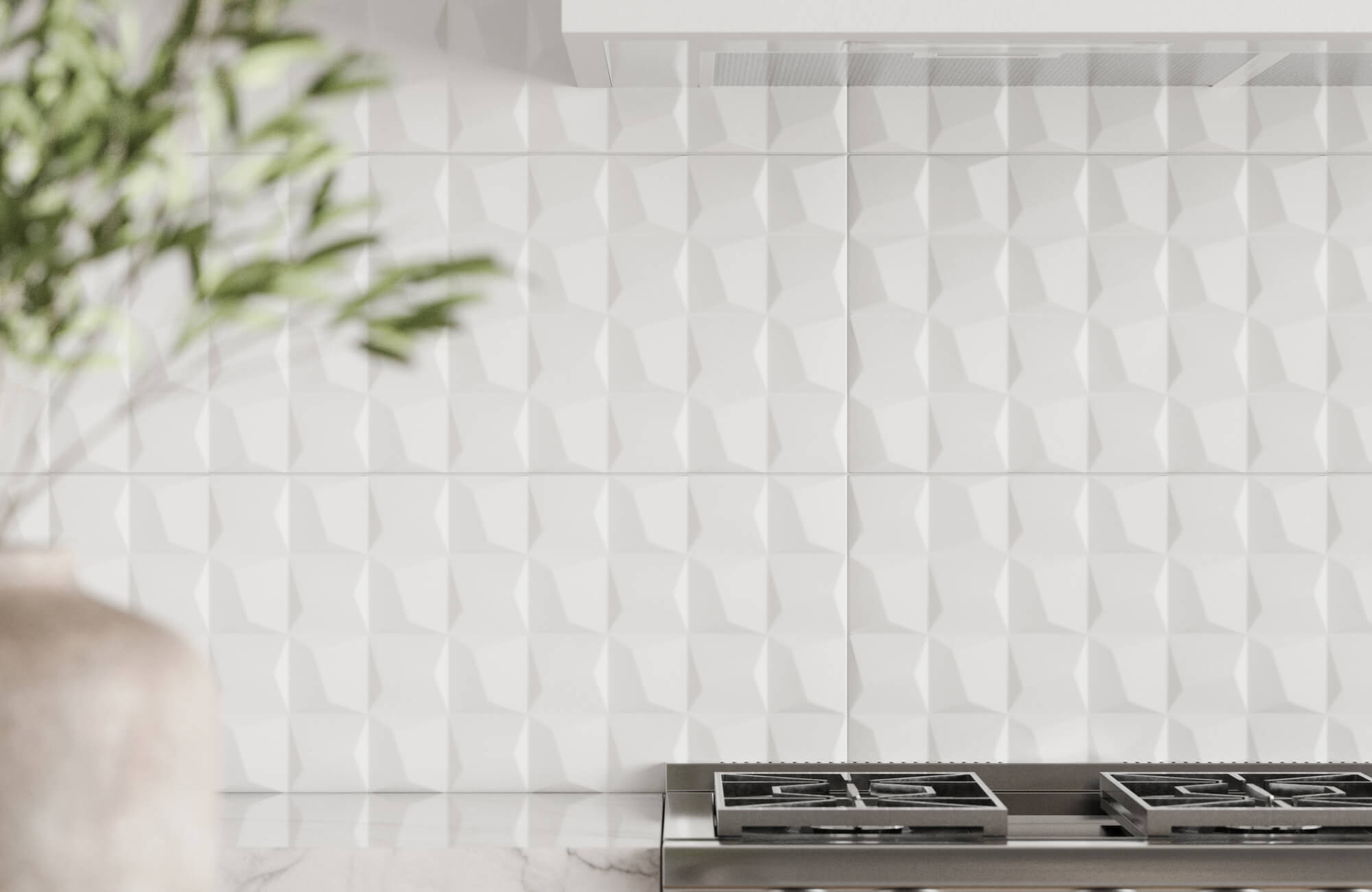 Sleek white 3D backsplash with a geometric cube pattern, adding depth and modern flair to a minimalist kitchen backsplash.