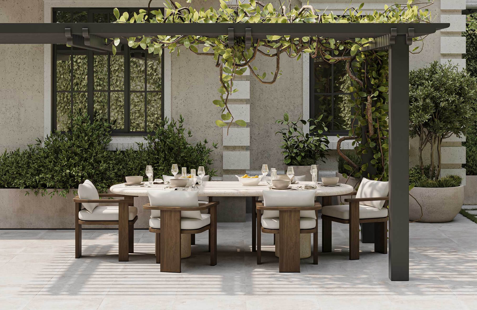 Neutral-toned outdoor dining setup with light wood chairs and a soft gray table, showing how popular neutral colors create a cohesive and balanced space.