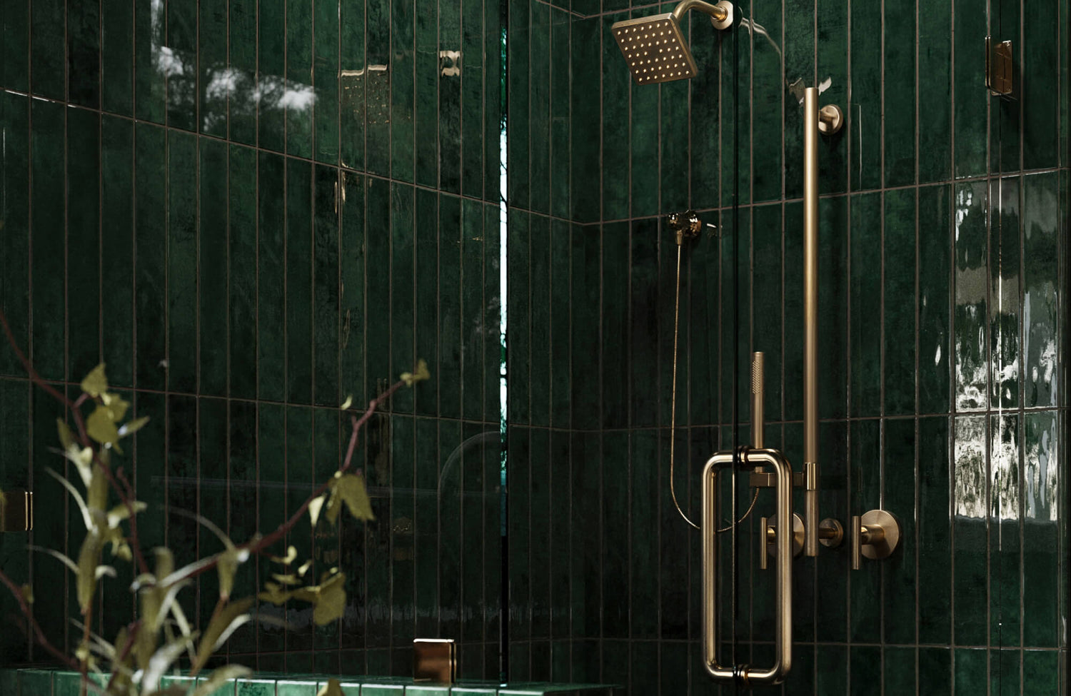A modern bathroom with green tiled walls, a wooden vanity with a marble-look countertop, black faucets, asymmetrical mirrors, elegant wall sconces, and a glass-enclosed shower.